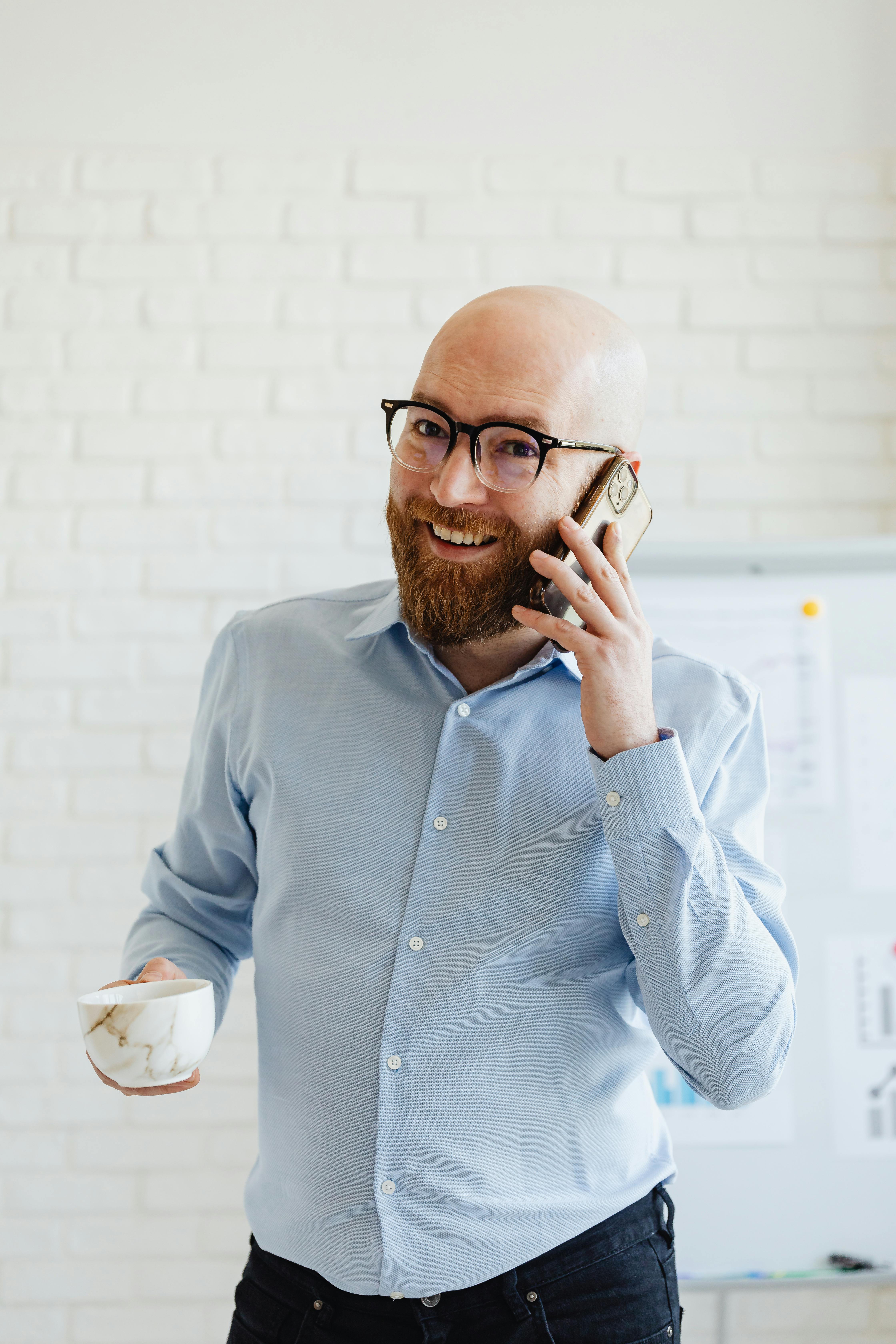 A happy man on a call | Source: Pexels
