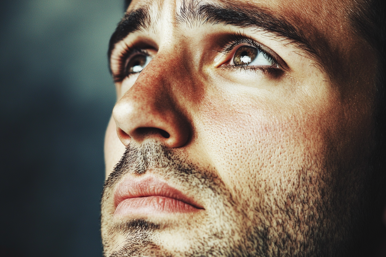 Close up of an emotional man's face | Source: Midjourney