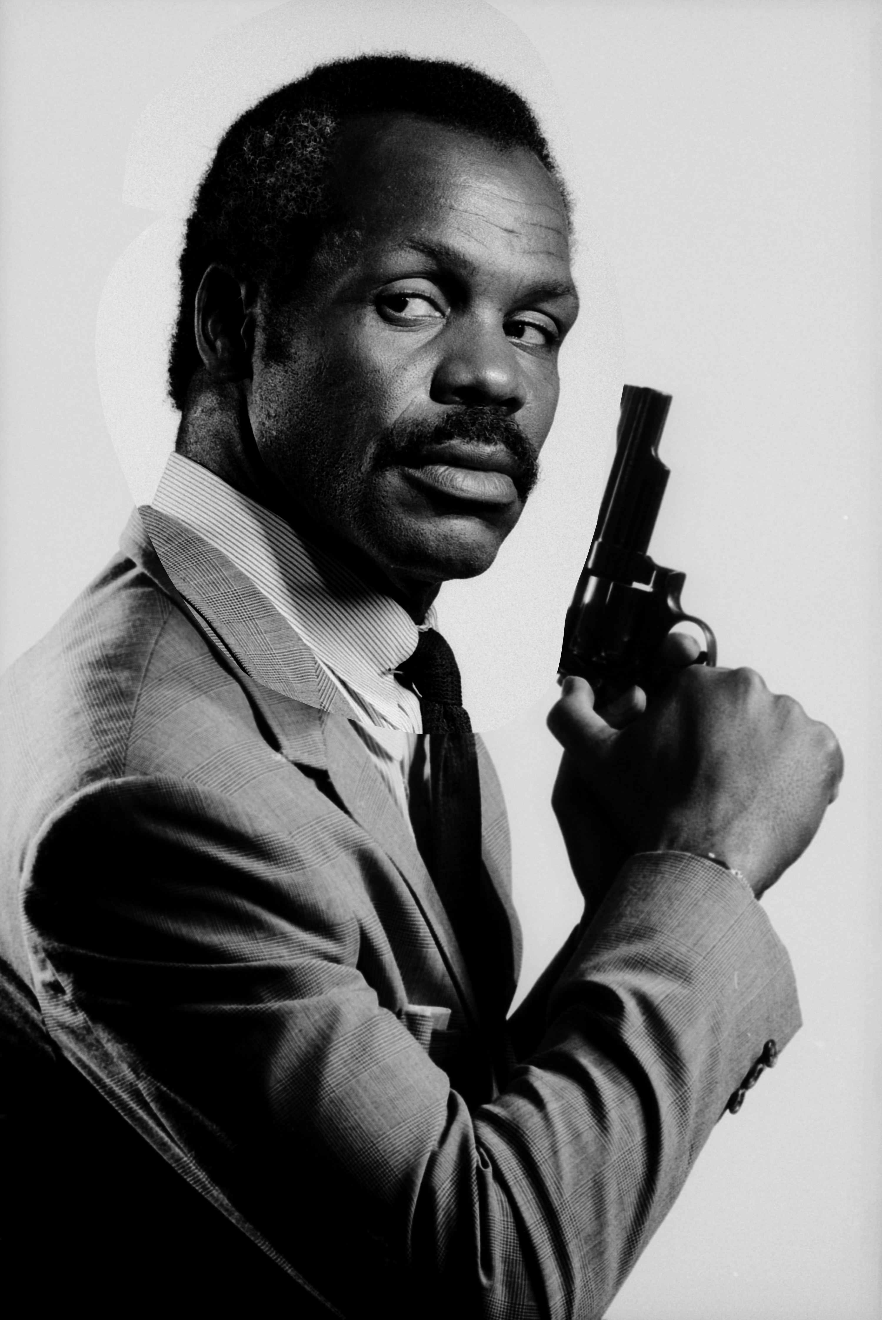Danny Glover poses for the "Lethal Weapon" movie poster in 1987 in Los Angeles, California. | Source: Getty Images