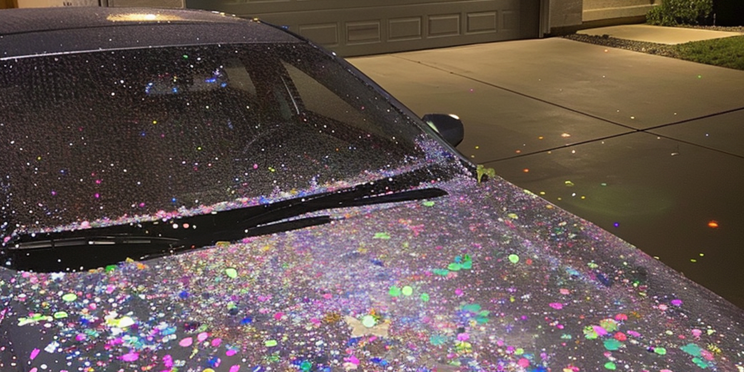 A car covered in glitter | Source: AmoMama