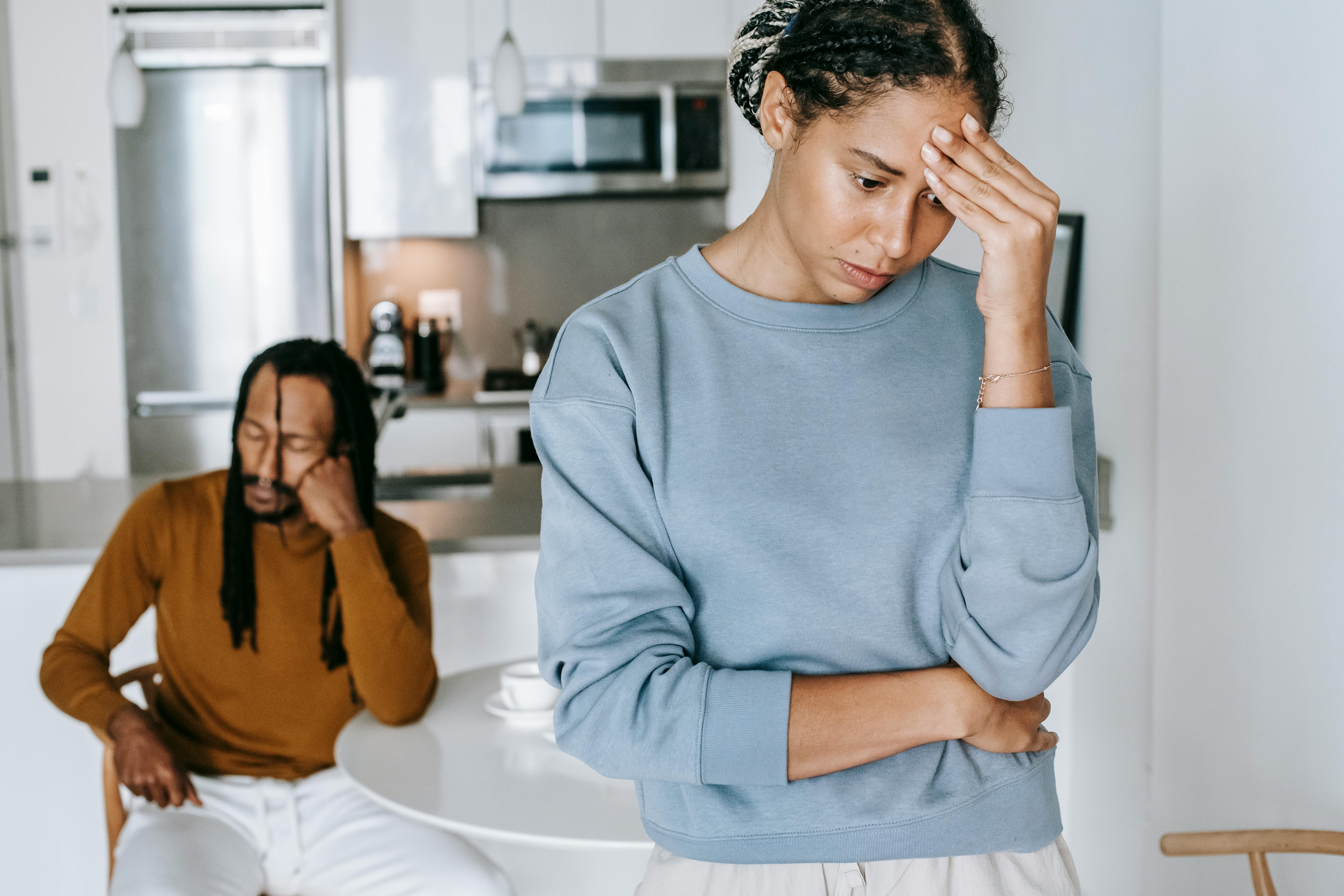 A woman turning away from a man in frustration | Source: Pexels