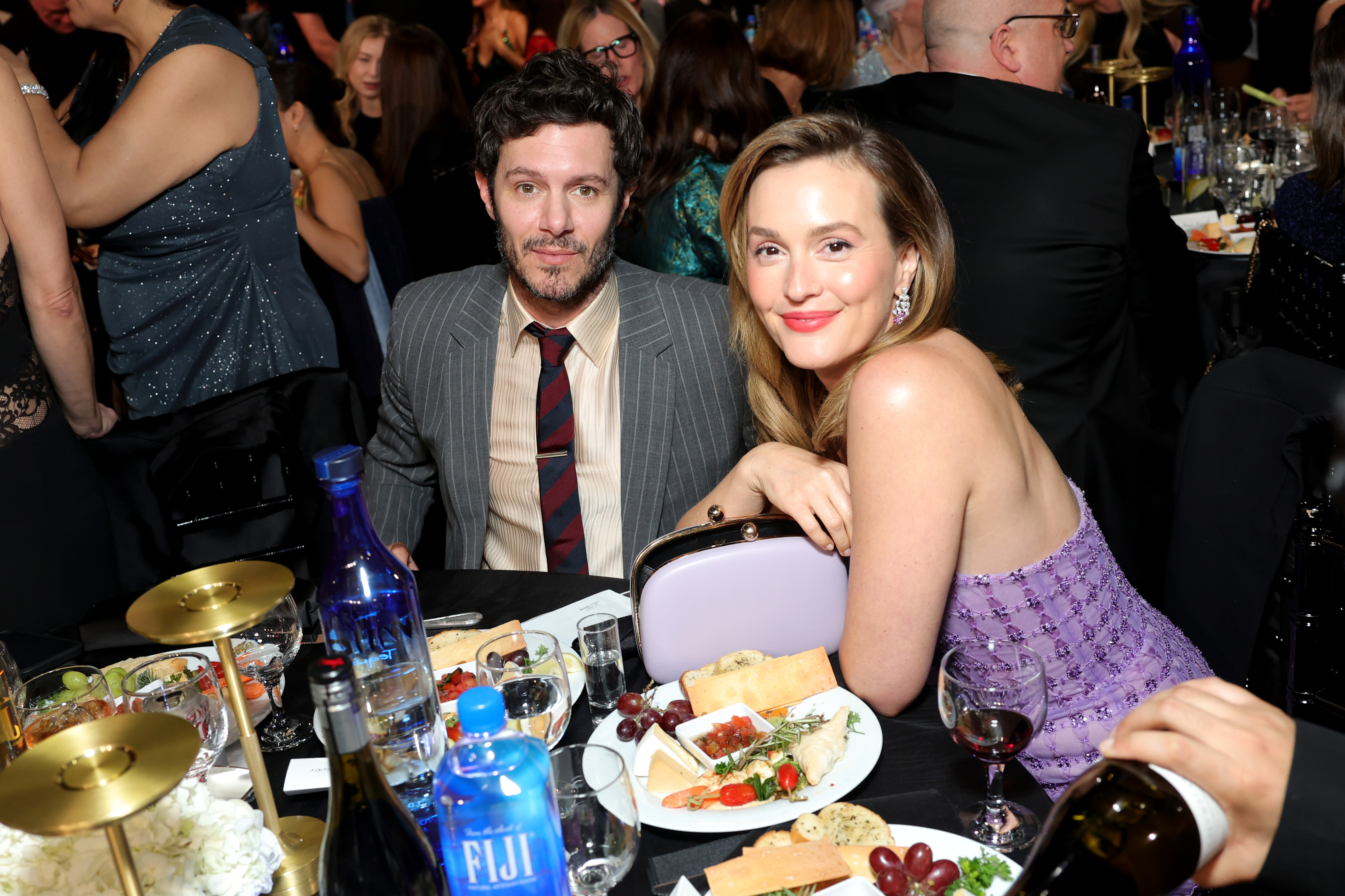 Adam Brody and Leighton Meester attend FIJI Water At The 31st Annual Critics Choice Awards at Barker Hangar on January 04, 2026 in Santa Monica, California. | Source: Getty Images