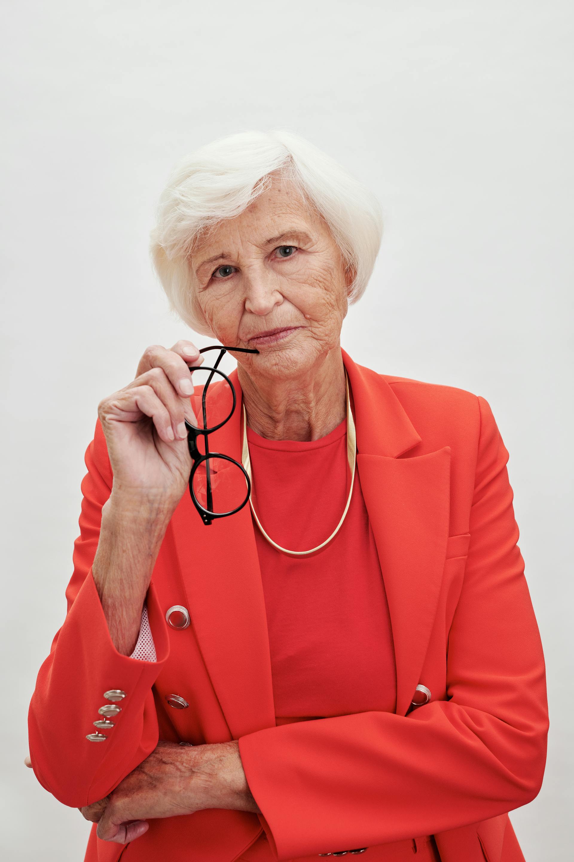 An elderly woman looking unhappy and serious | Source: Pexels