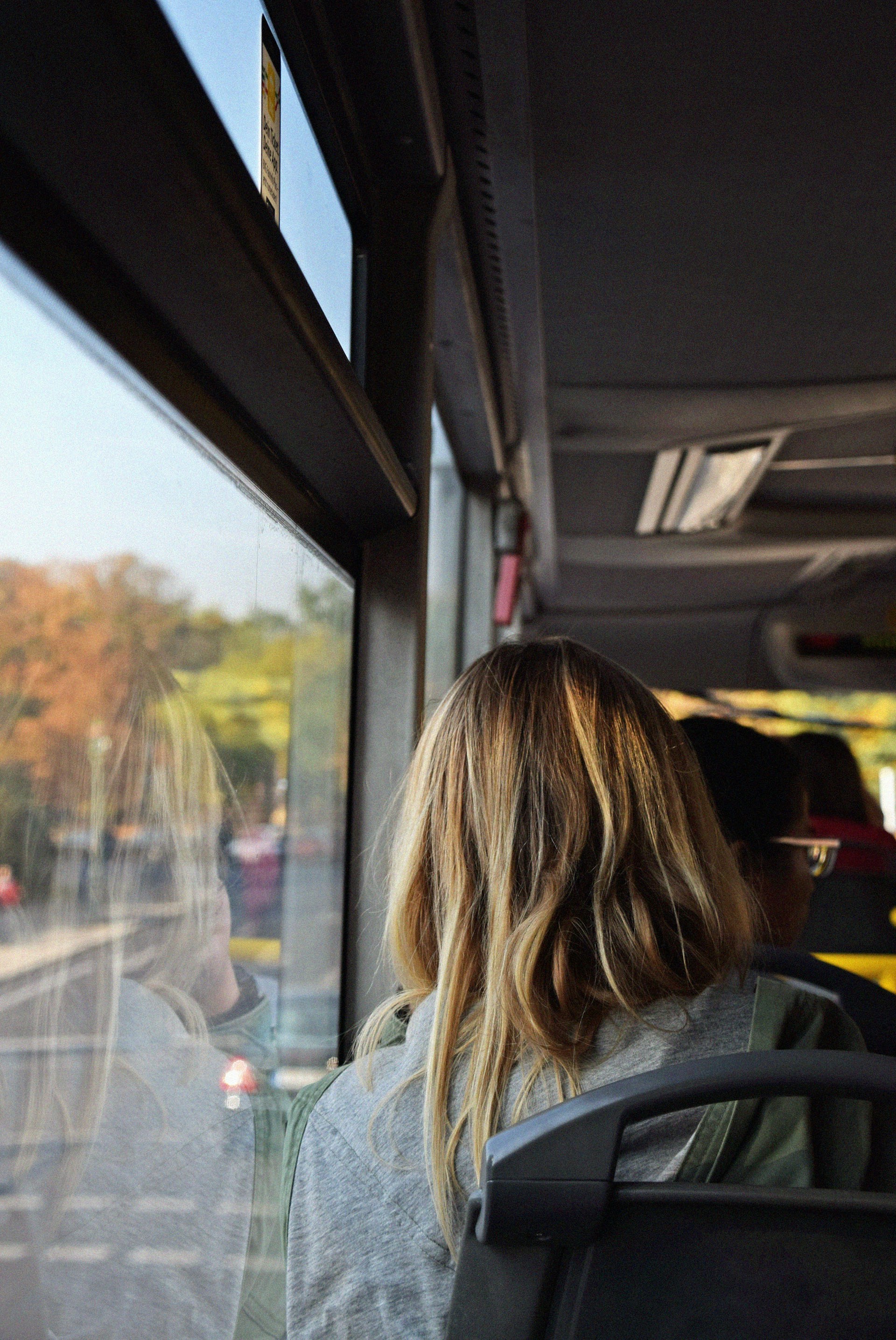 A woman sitting on a bus | Source: Unsplash