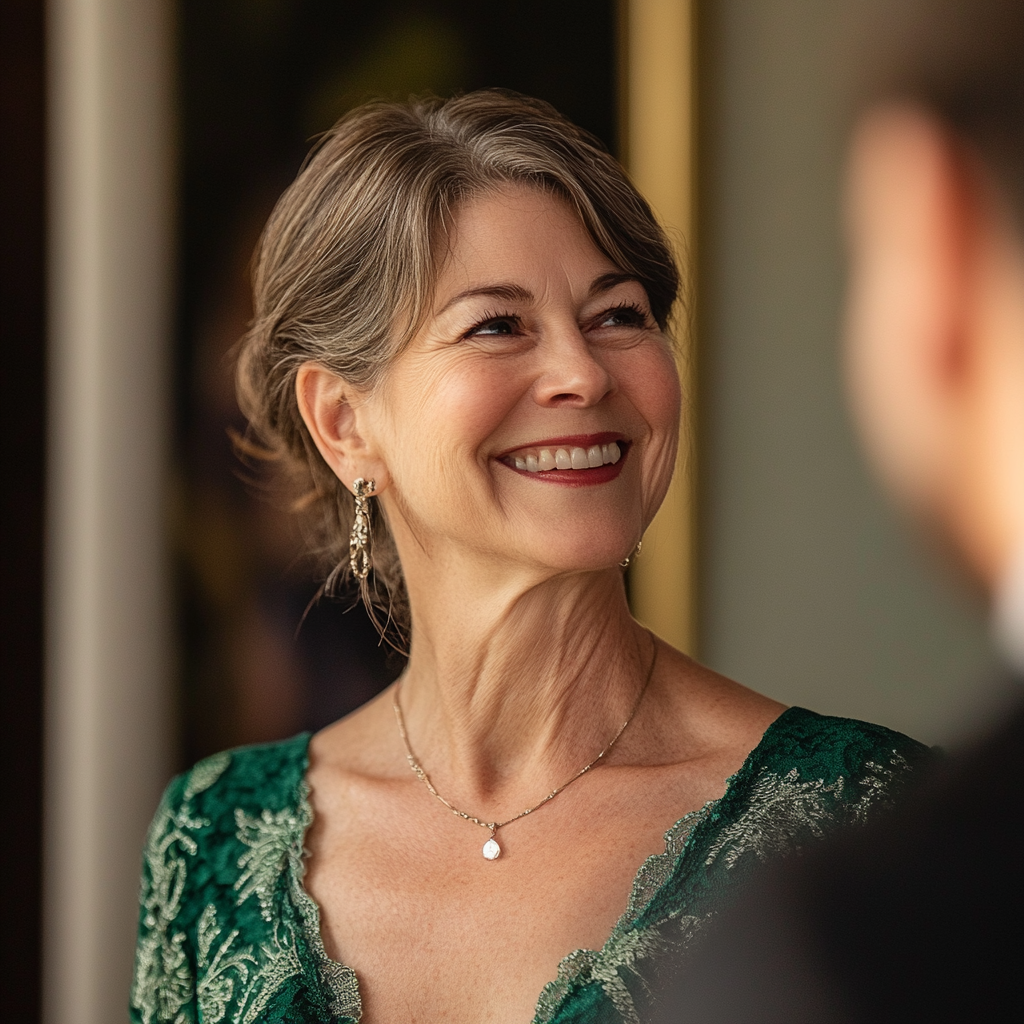 A middle-aged woman smiles while looking at someone | Source: Midjourney