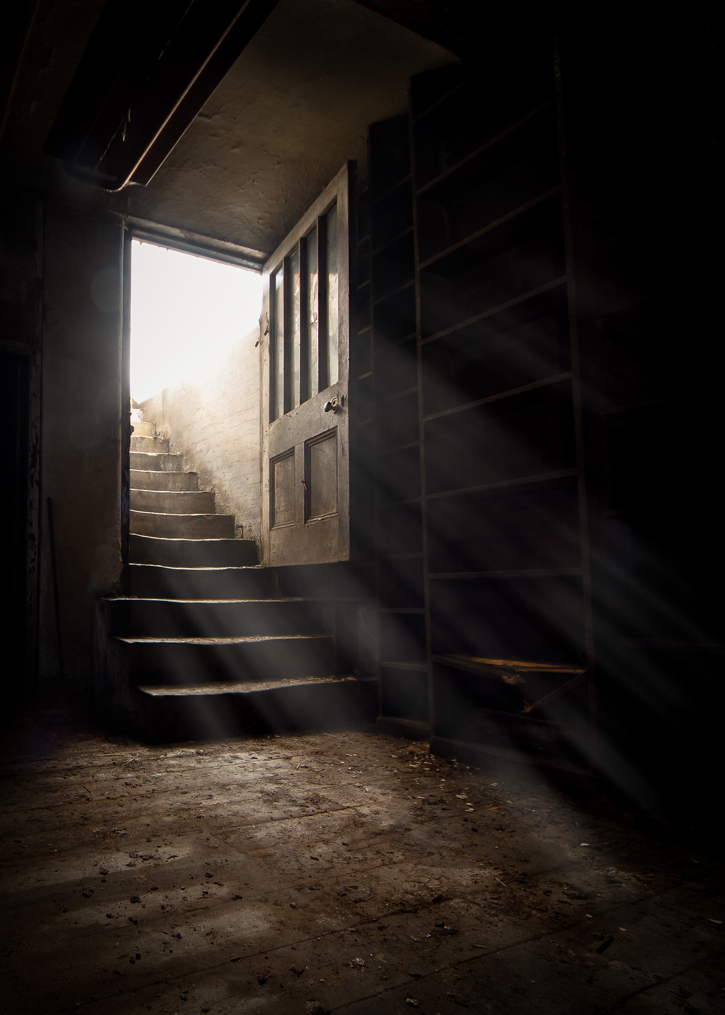 An opened door to the basement | Source: Shutterstock