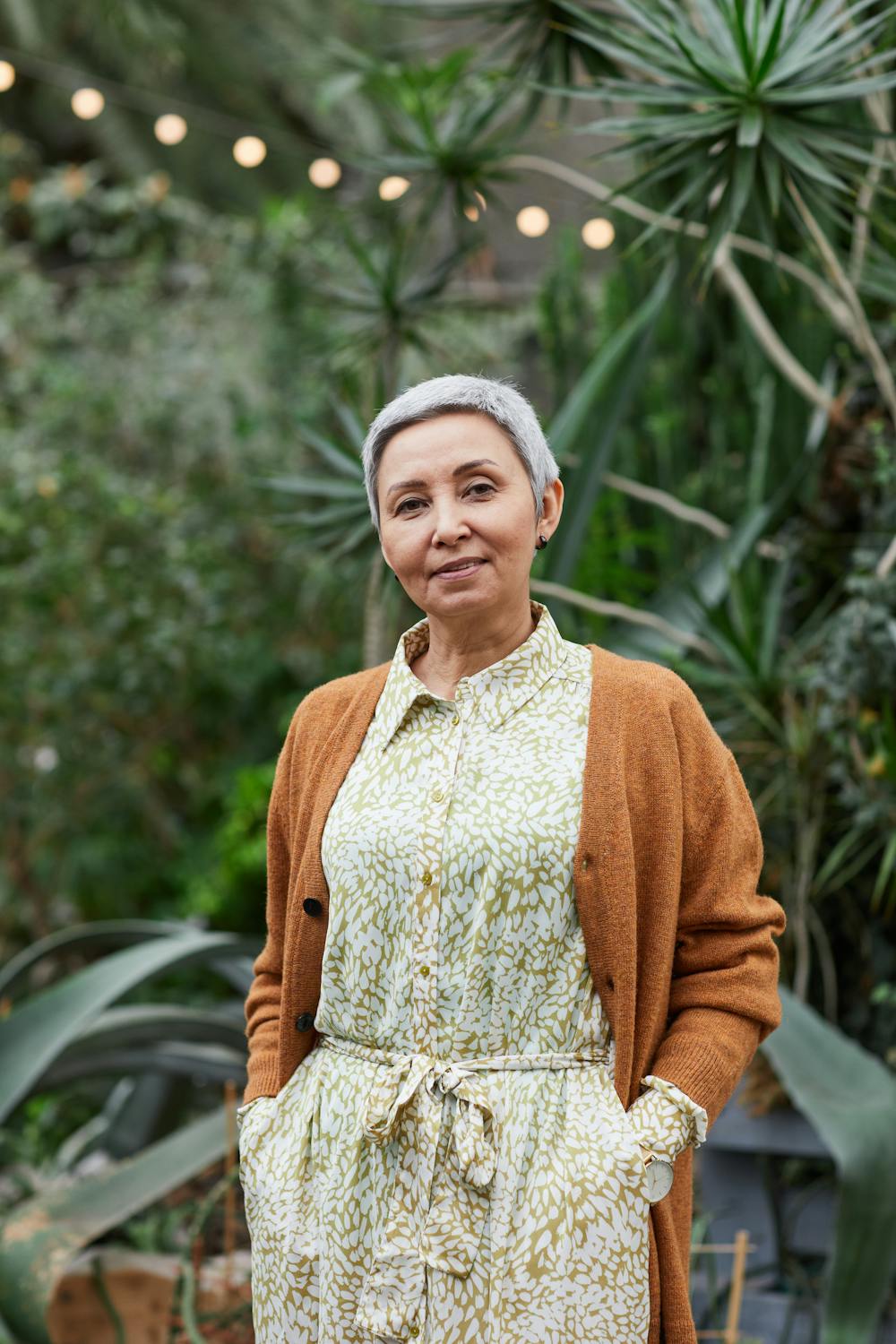 A smiling woman in a dress | Source: Pexels