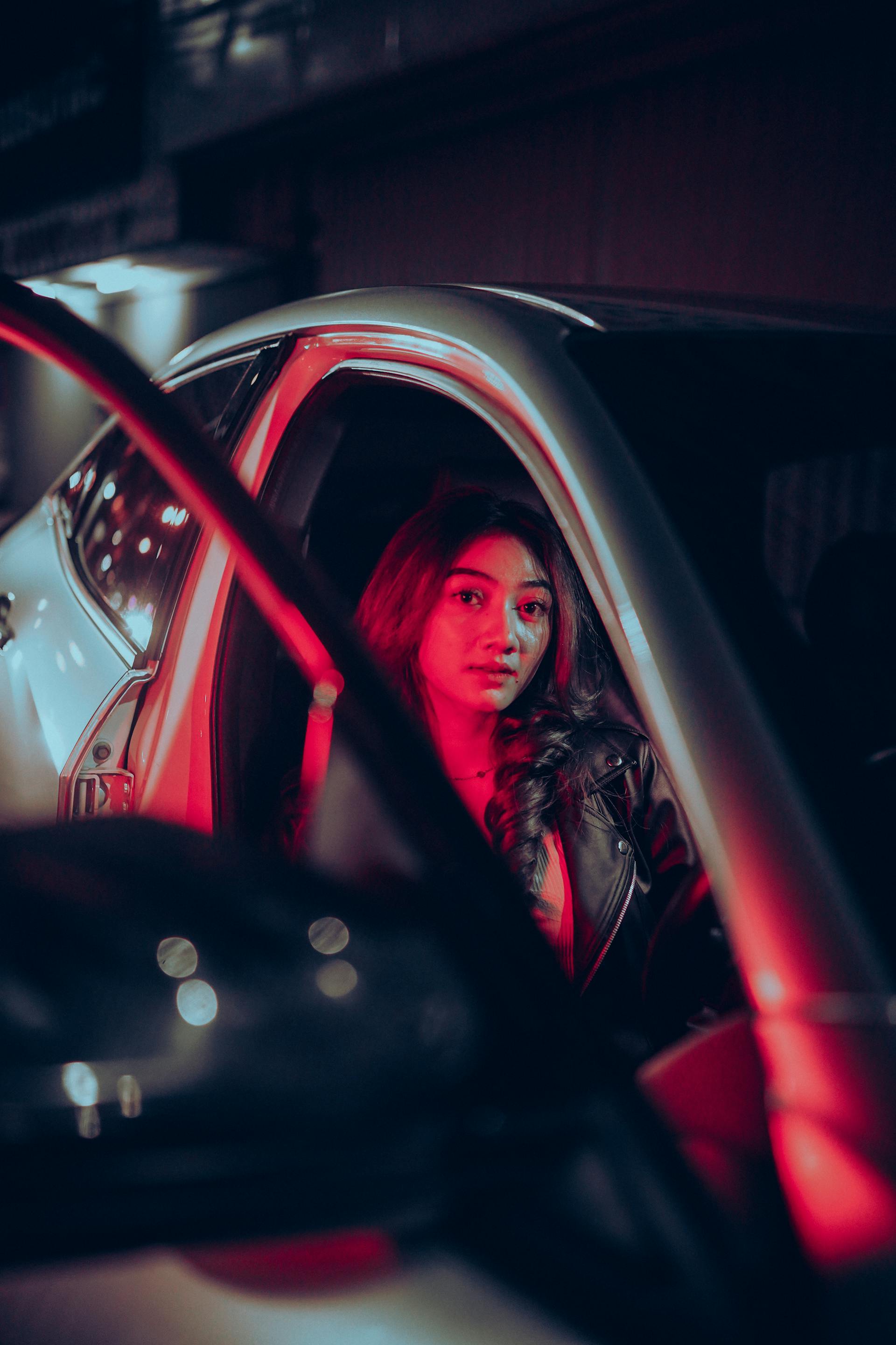 A woman getting into a car | Source: Pexels