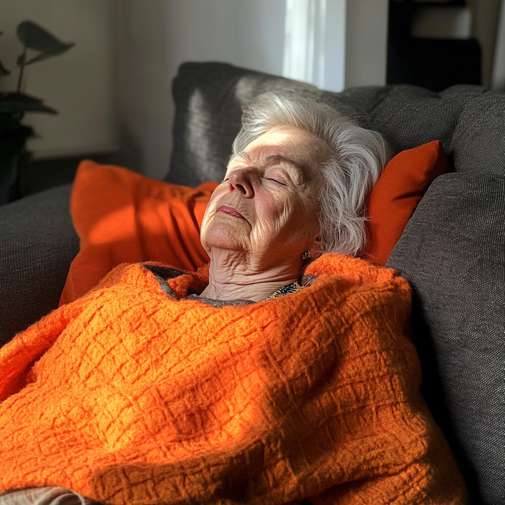 An older woman laying on a couch | Source: Midjourney