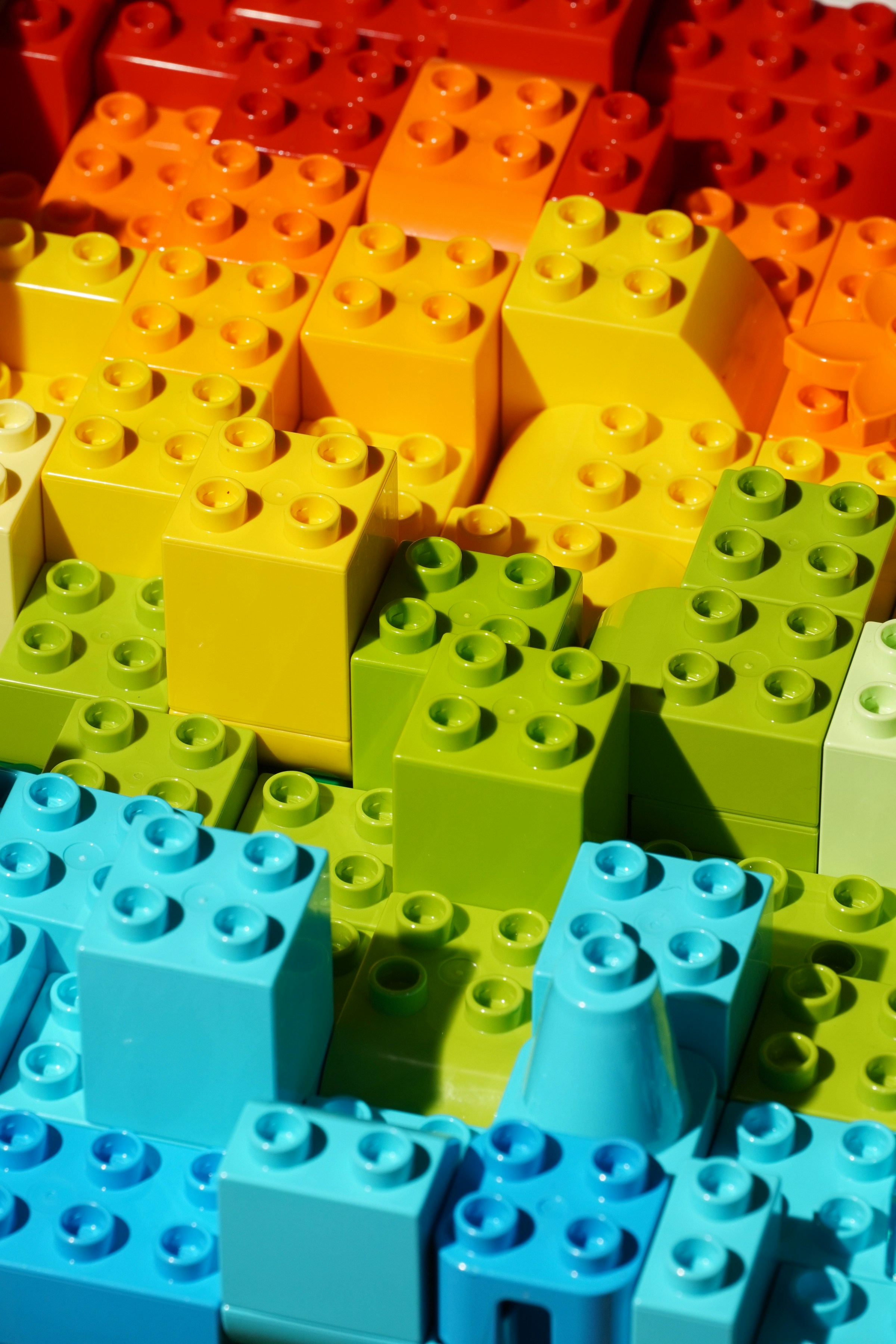 A close-up shot of many different colored pieces of LEGO | Source: Unsplash