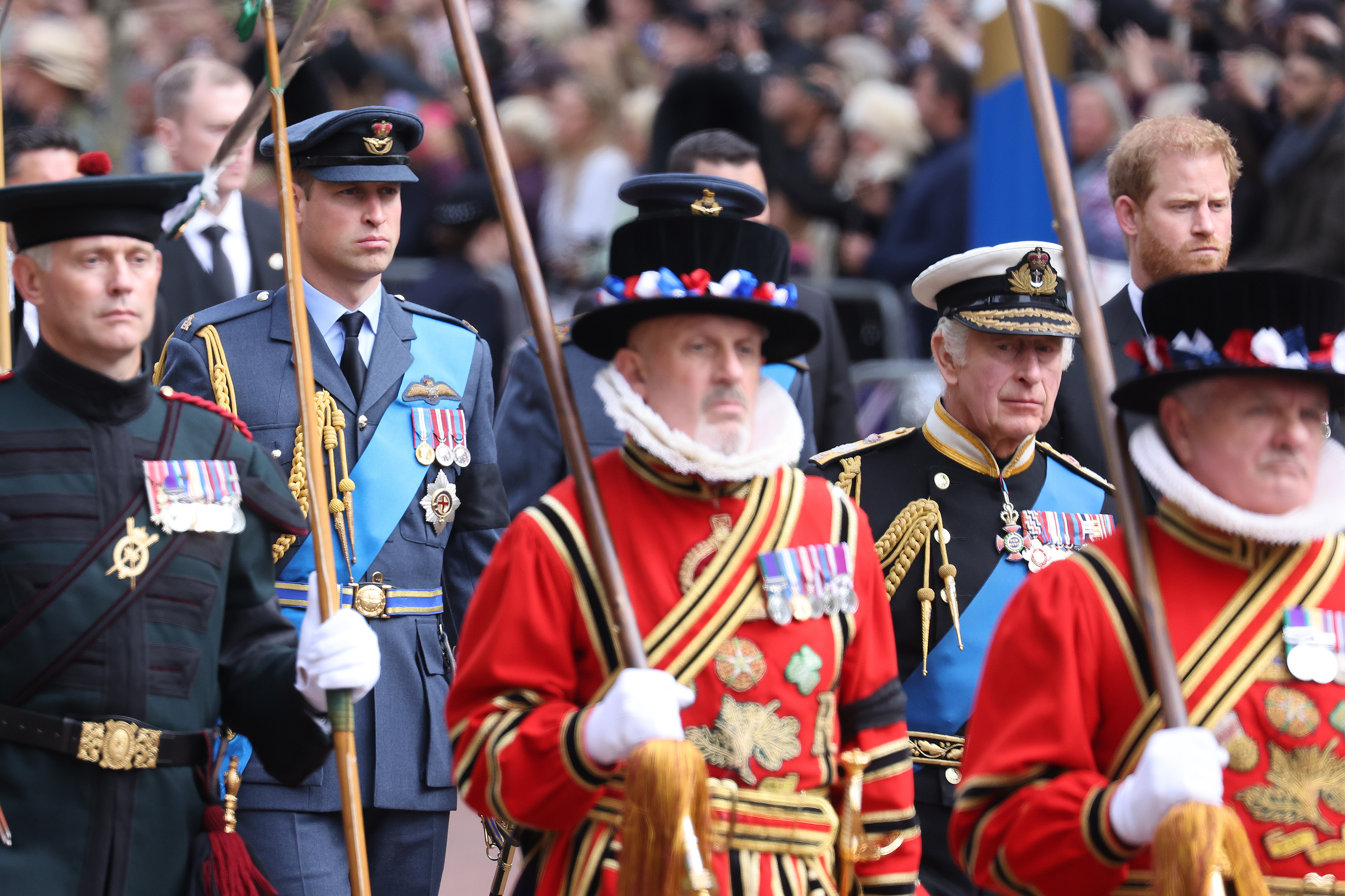 King Charles III, Prince William, Prince of Wales and and Prince Harry, Duke of Sussex during the procession of the coffin towards Buckingham Palace following the State Funeral of Queen Elizabeth II at Westminster Abbey on September 19, 2022 in London, England. | Source: Getty Images