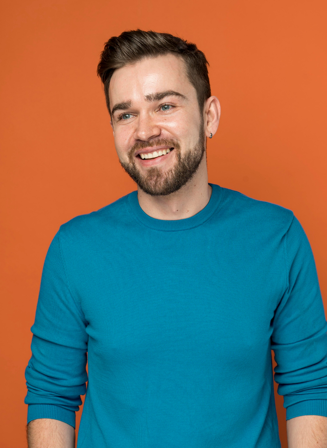 A man smiling | Source: Freepik
