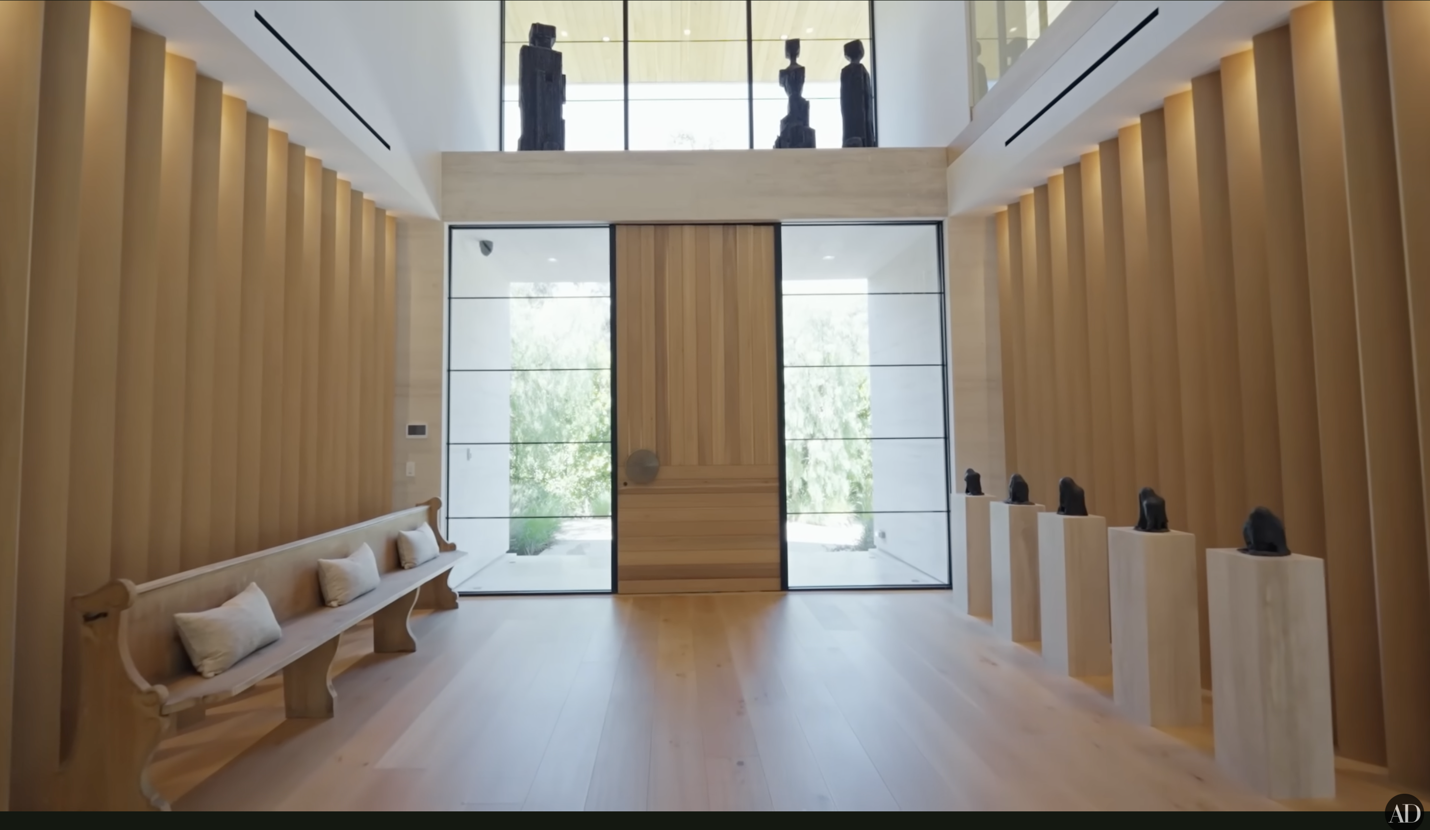 The entrance of Zedd's home, shared by Architectural Digest on November 8, 2025. | Source: YouTube/Architectural Digest