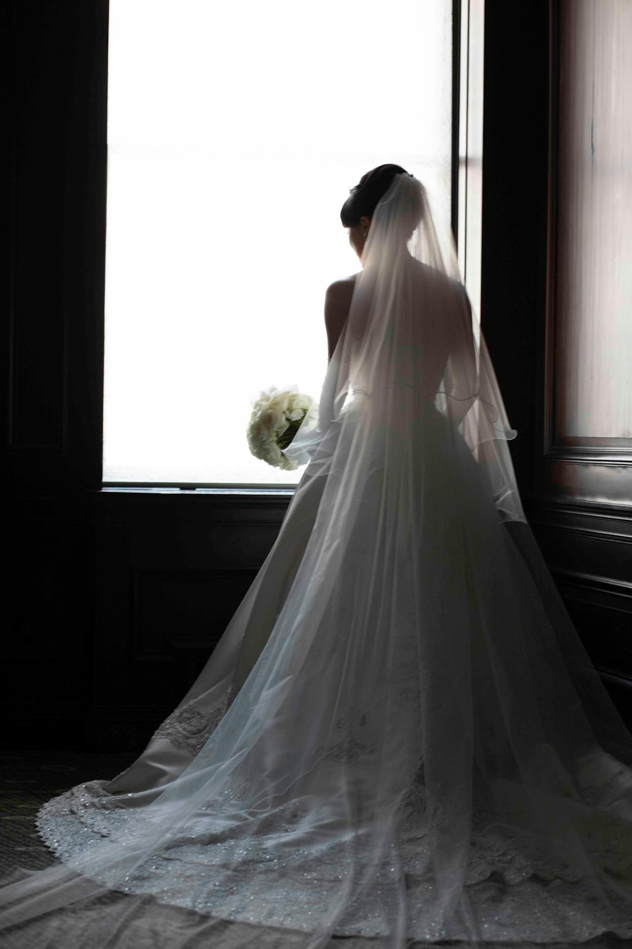 A bride standing near the window | Source: Pexels