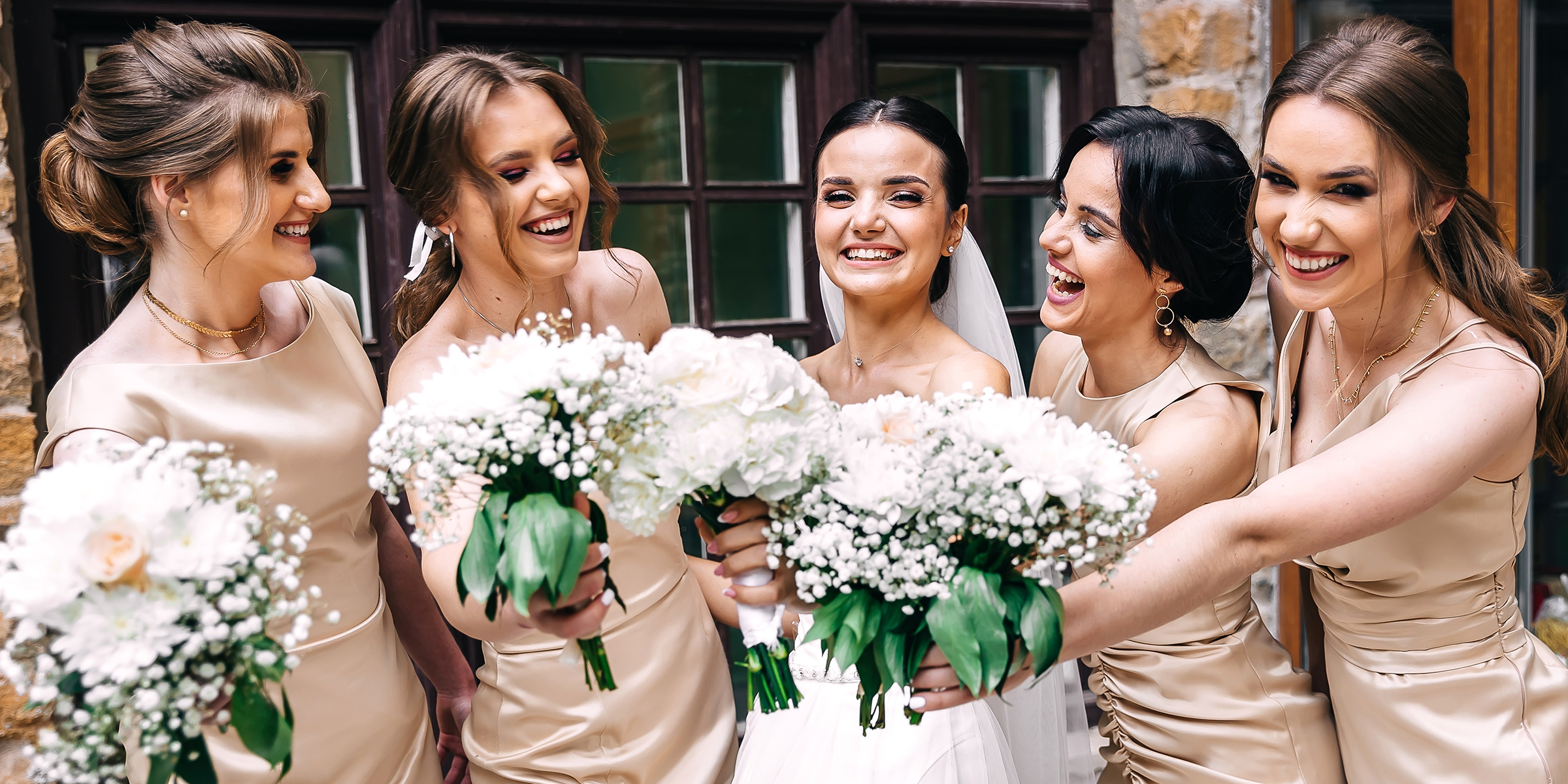 A bride with her bridesmaids | Source: Shutterstock