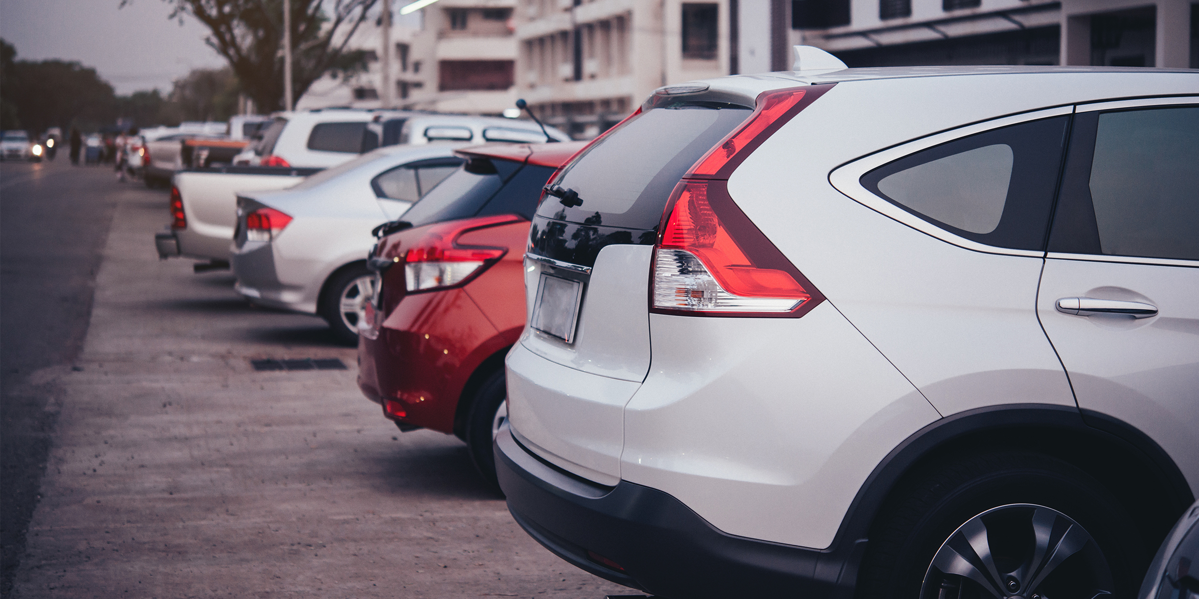 Cars in a parking lot | Source: Freepik