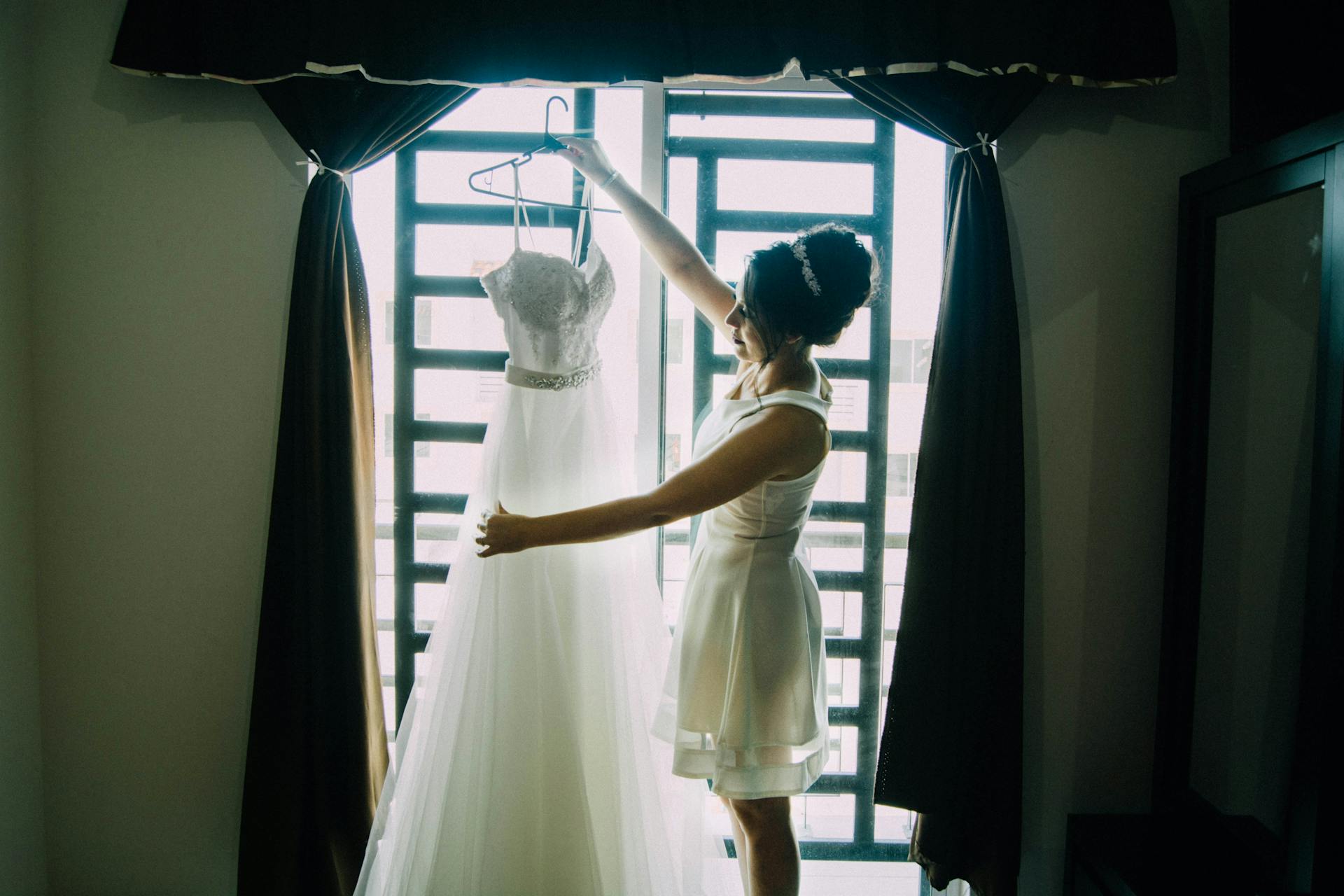 My Sister Excluded My Son from Her Wedding After He Made Her Dress, but Still Expected to Wear It – We Gave Her One Condition to Keep It 16 A woman admiring a wedding gown | Source: Pexels