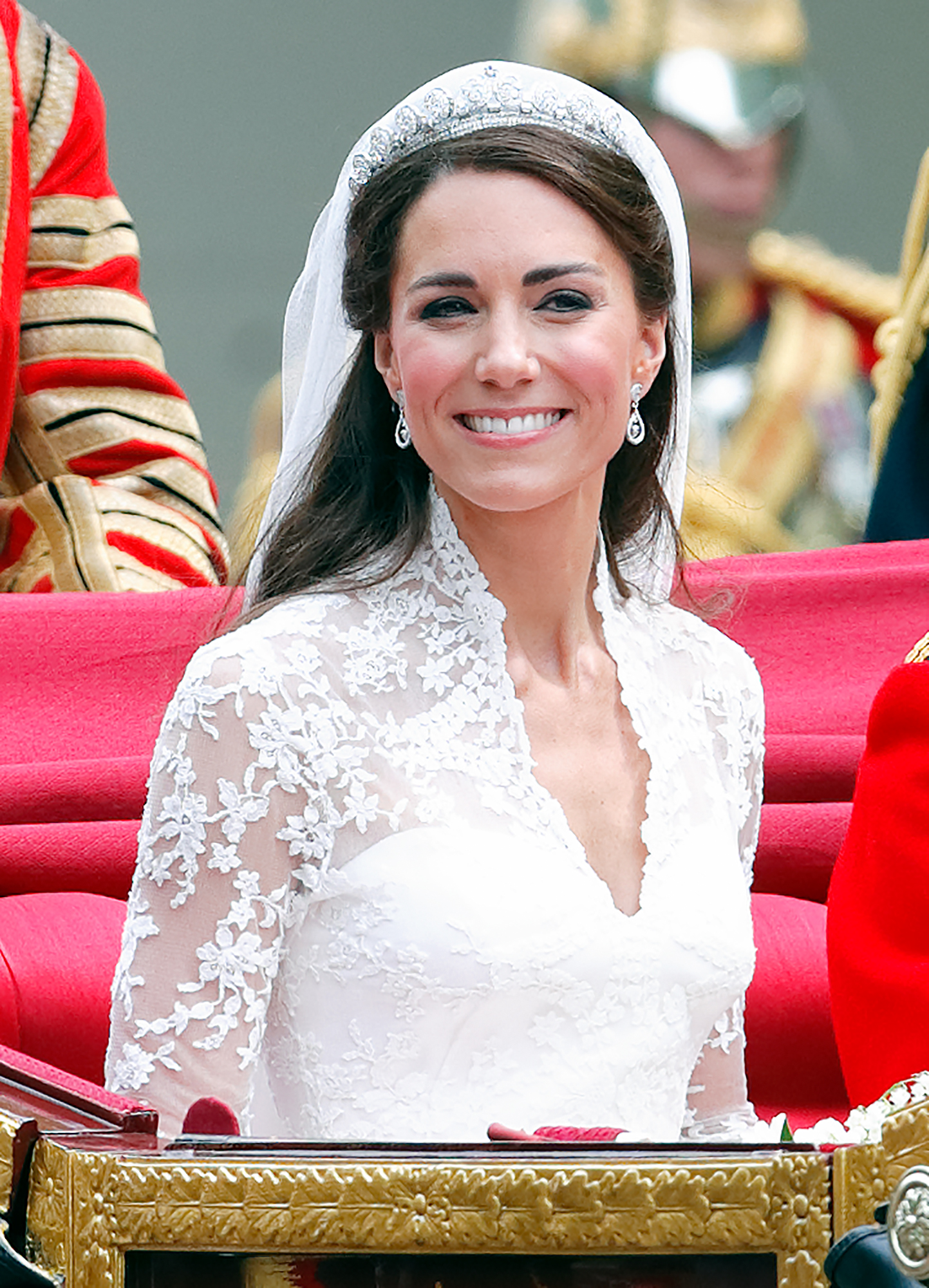 Catherine, Duchess of Cambridge travels down The Mall, on route to Buckingham Palace, in the 1902 State Landau horse drawn carriage following her and Prince William, Duke of Cambridge's wedding ceremony at Westminster Abbey on April 29, 2011 in London, England. | Source: Getty Images
