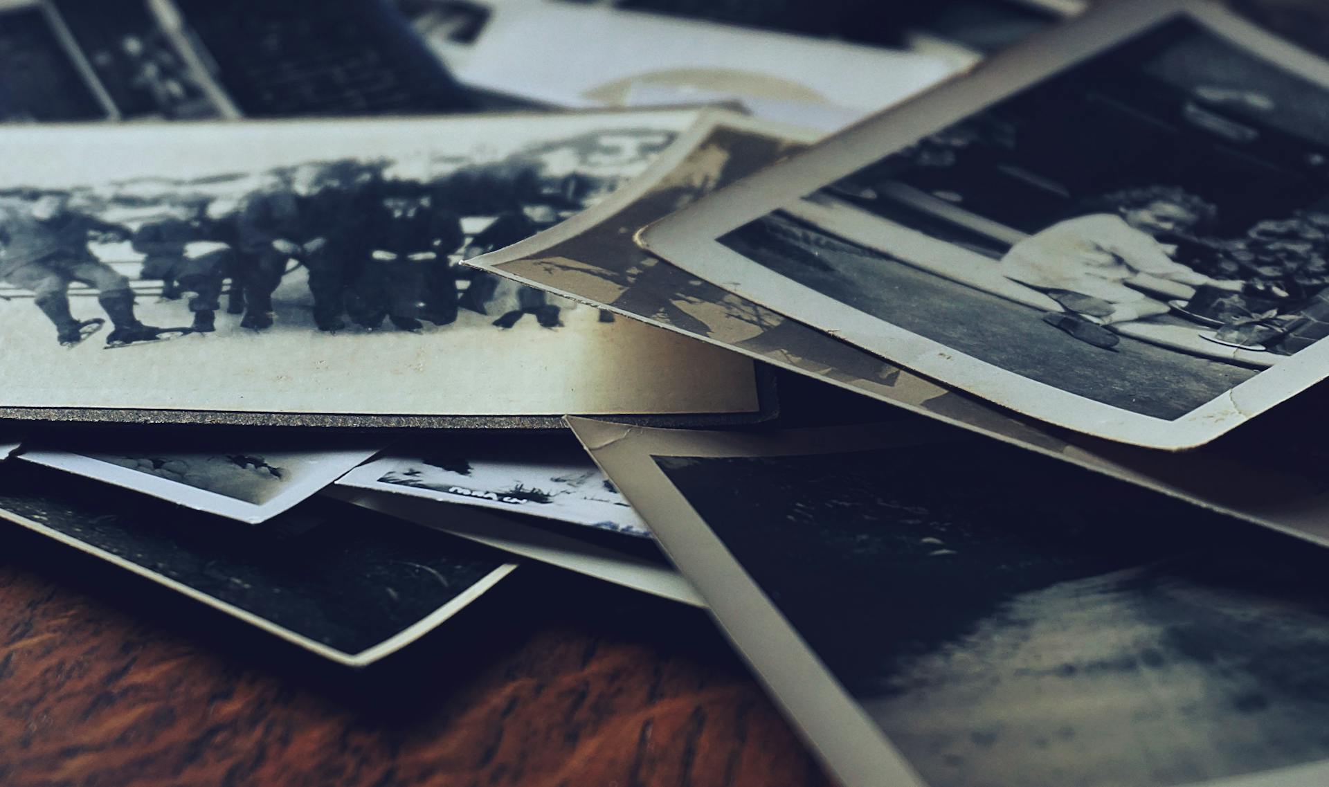 Old photographs on a table | Source: Pexels