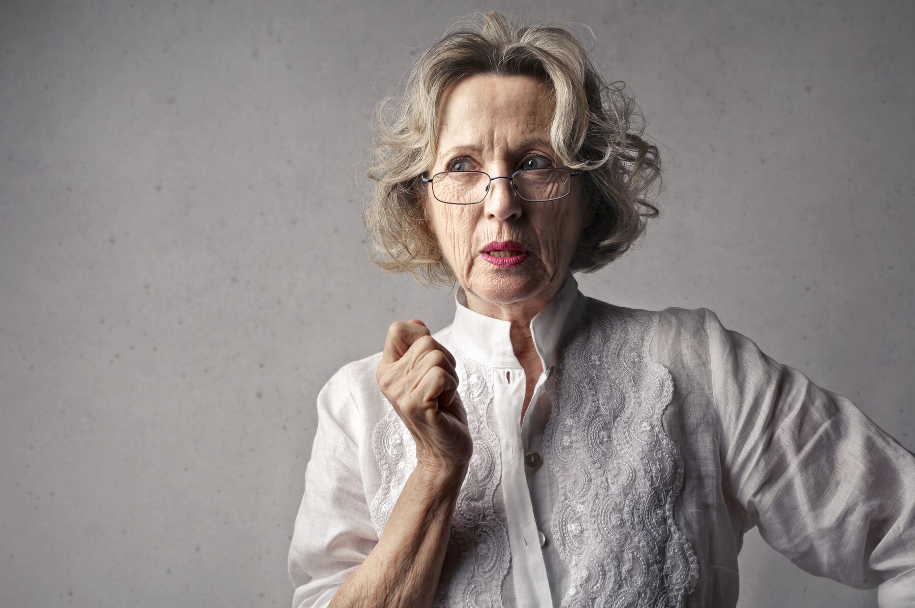 An angry elderly woman | Source: Freepik