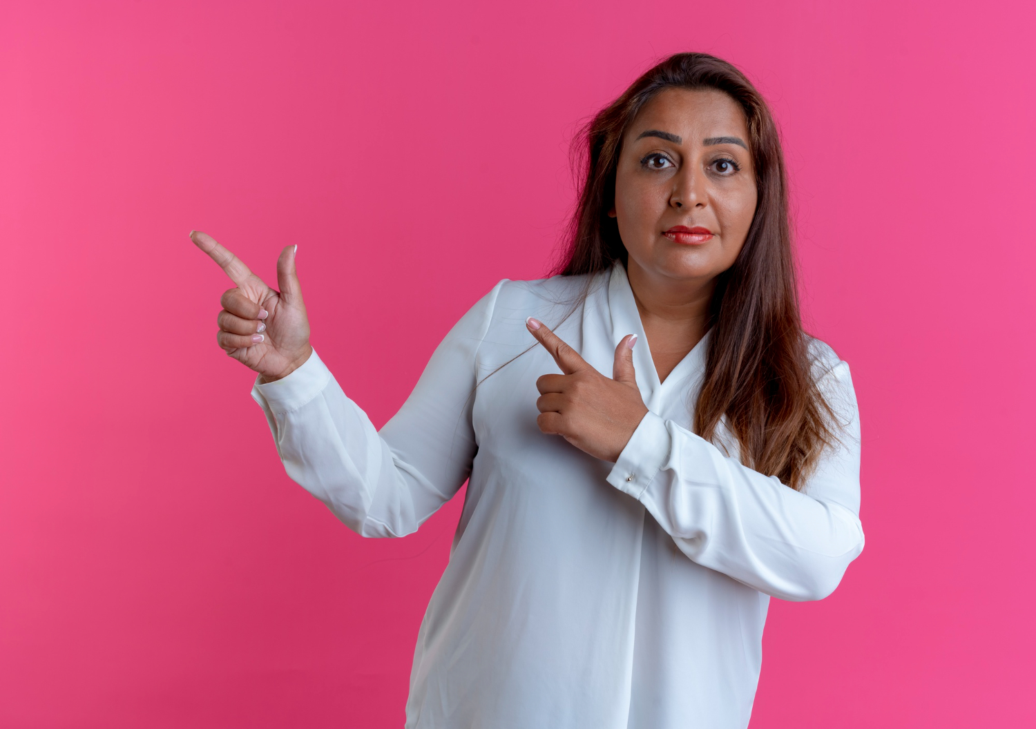 A woman gesturing with her hands | Source: Freepik
