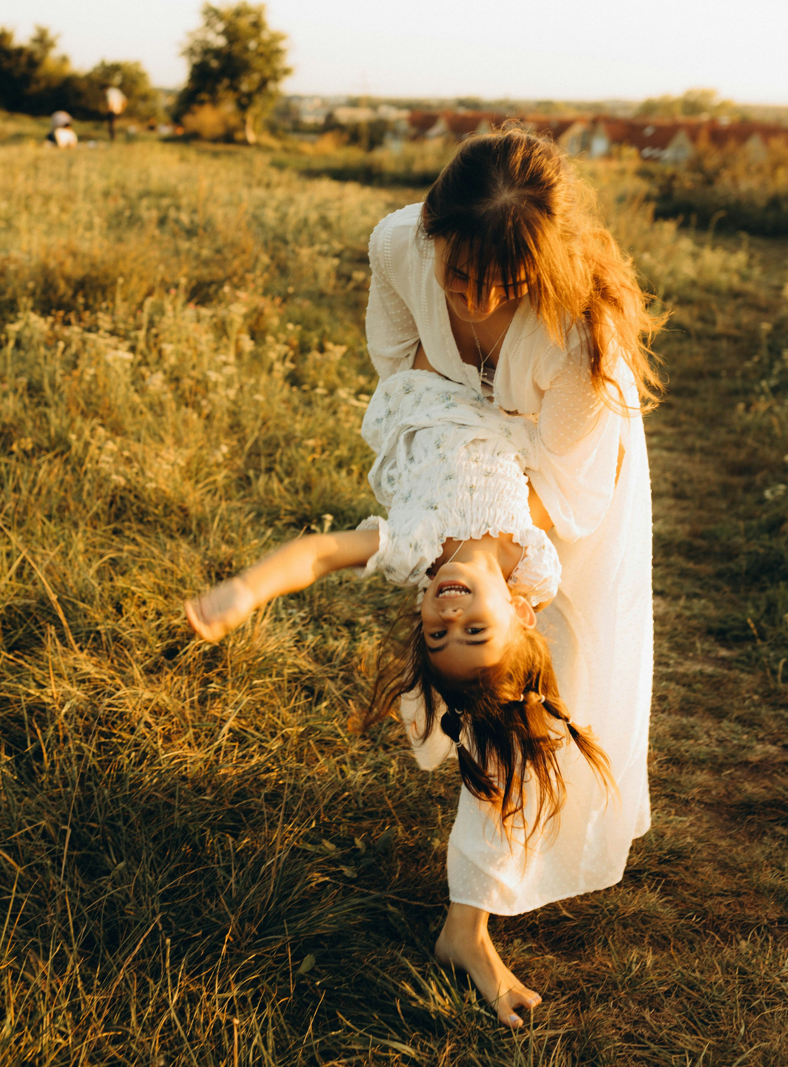 A mother having fun with her daughter | Source: Unsplash