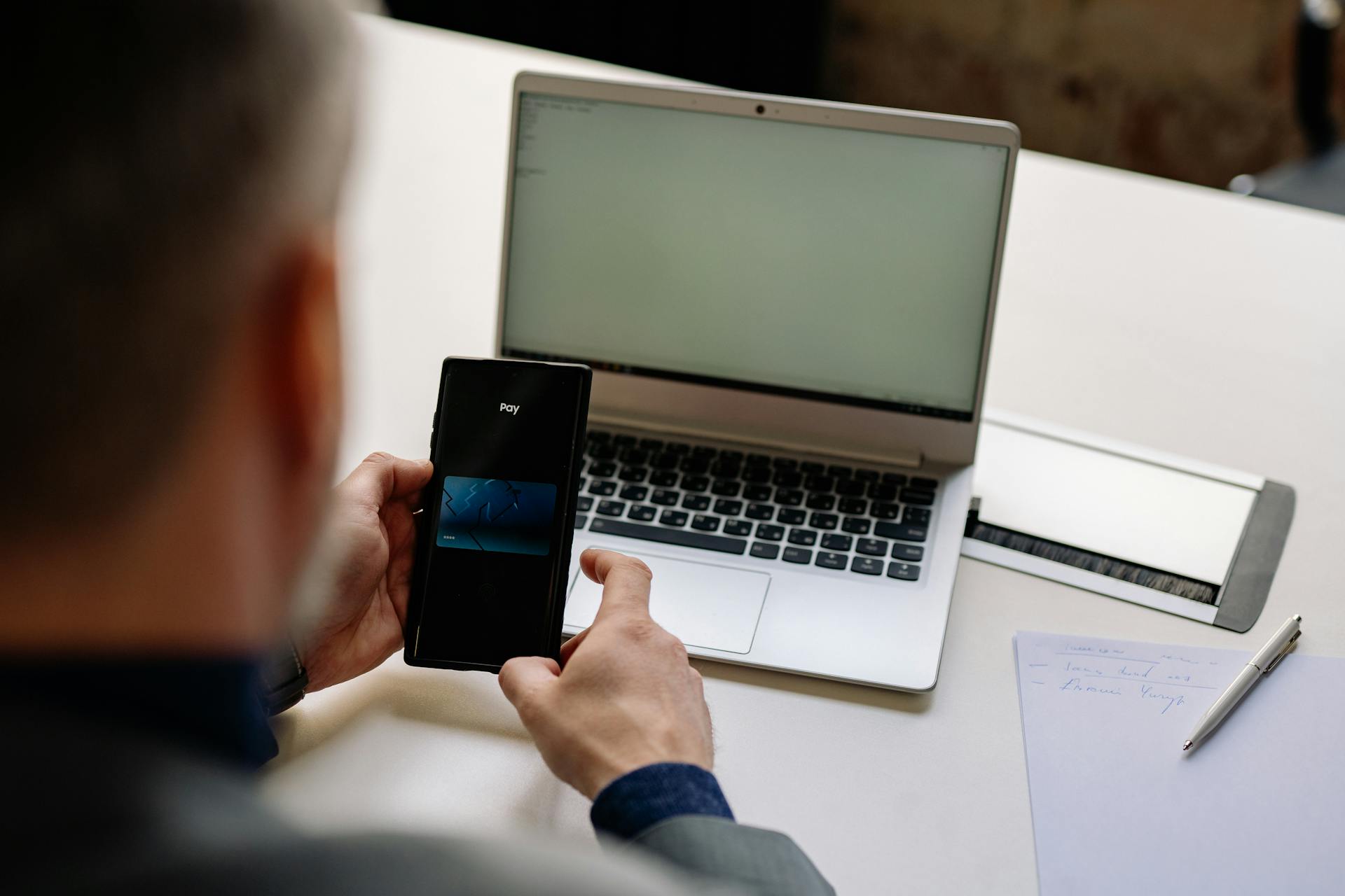 A man using his phone | Source: Pexels