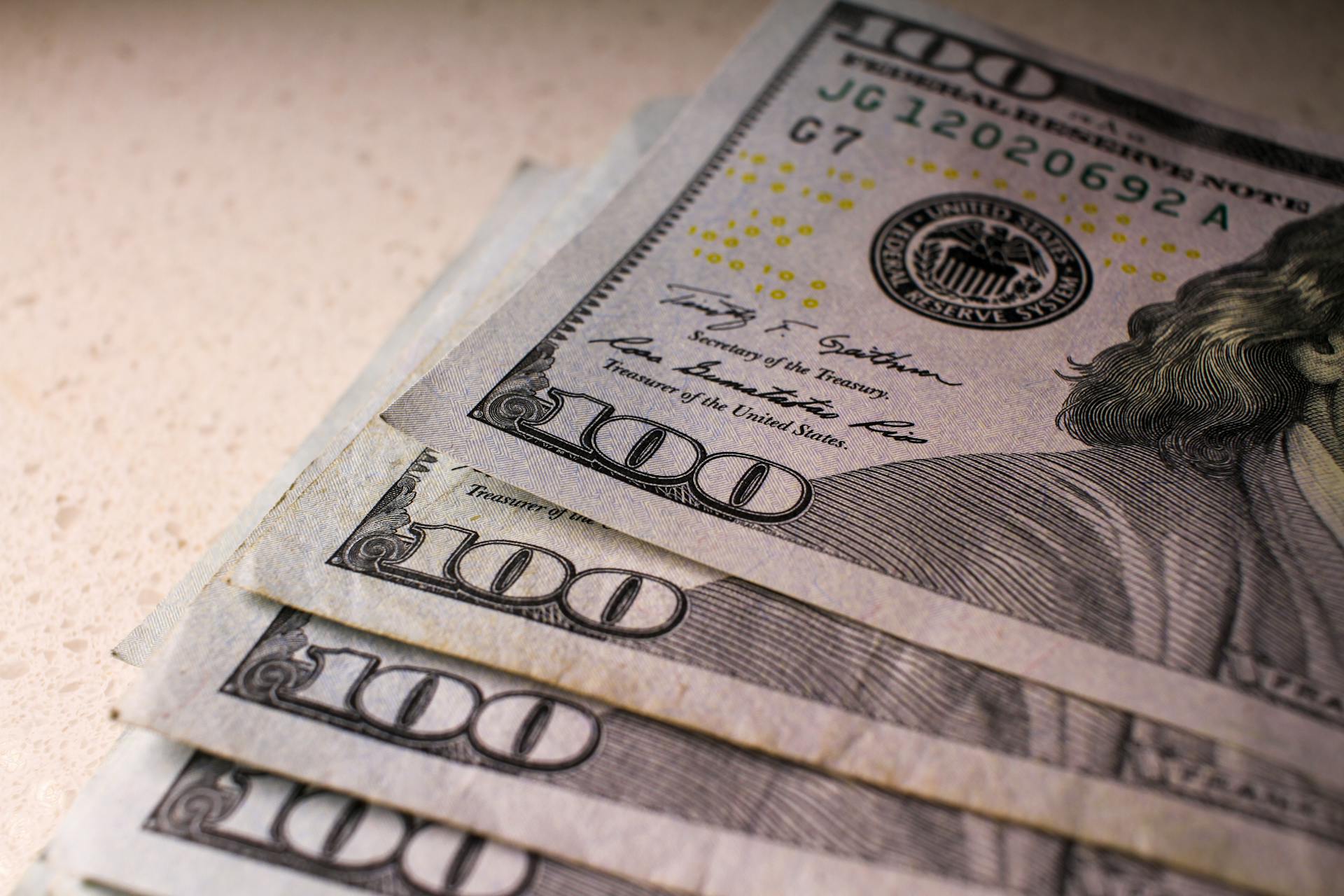 A close-up shot of $100 bills | Source: Pexels