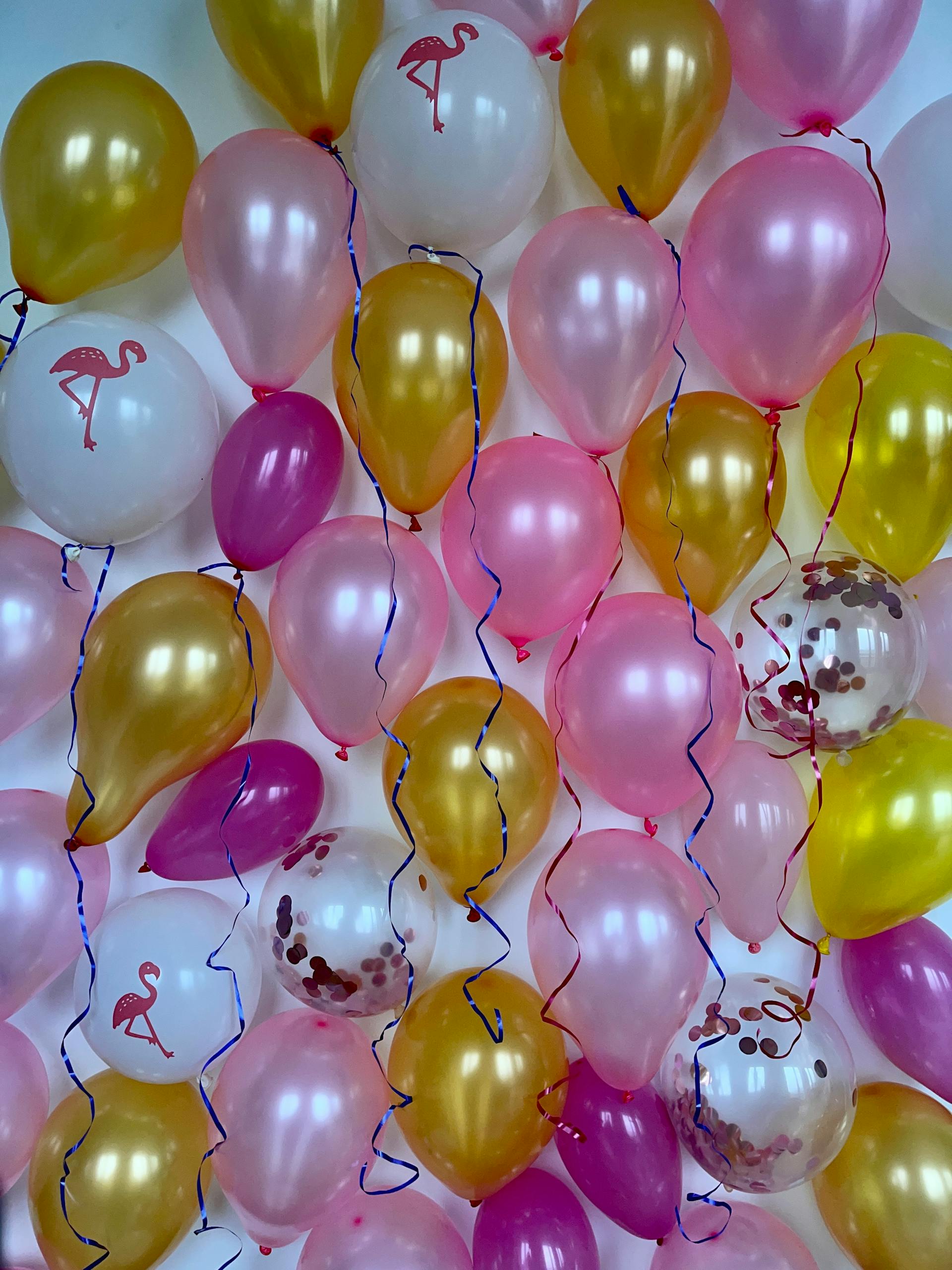 Balloons on a wall | Source: Pexels