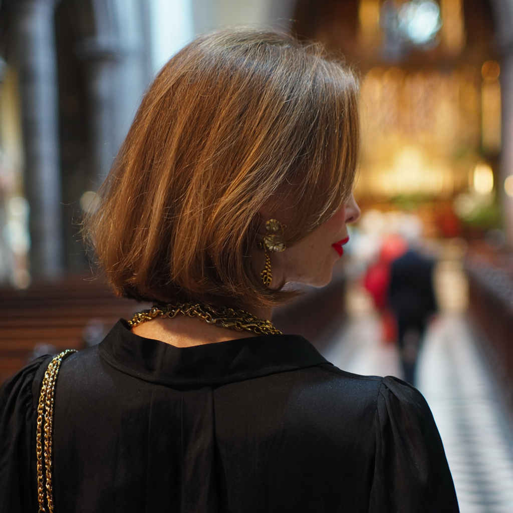 The rear view of a woman standing in a church | Source: Midjourney