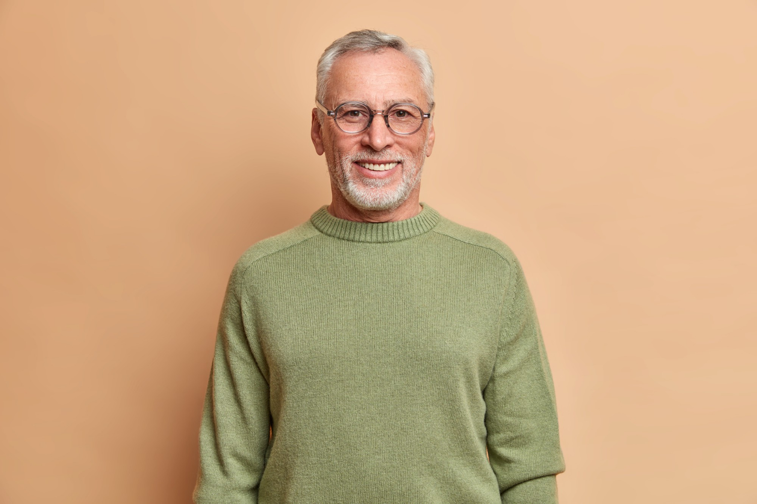 A delighted man smiling | Source: Freepik
