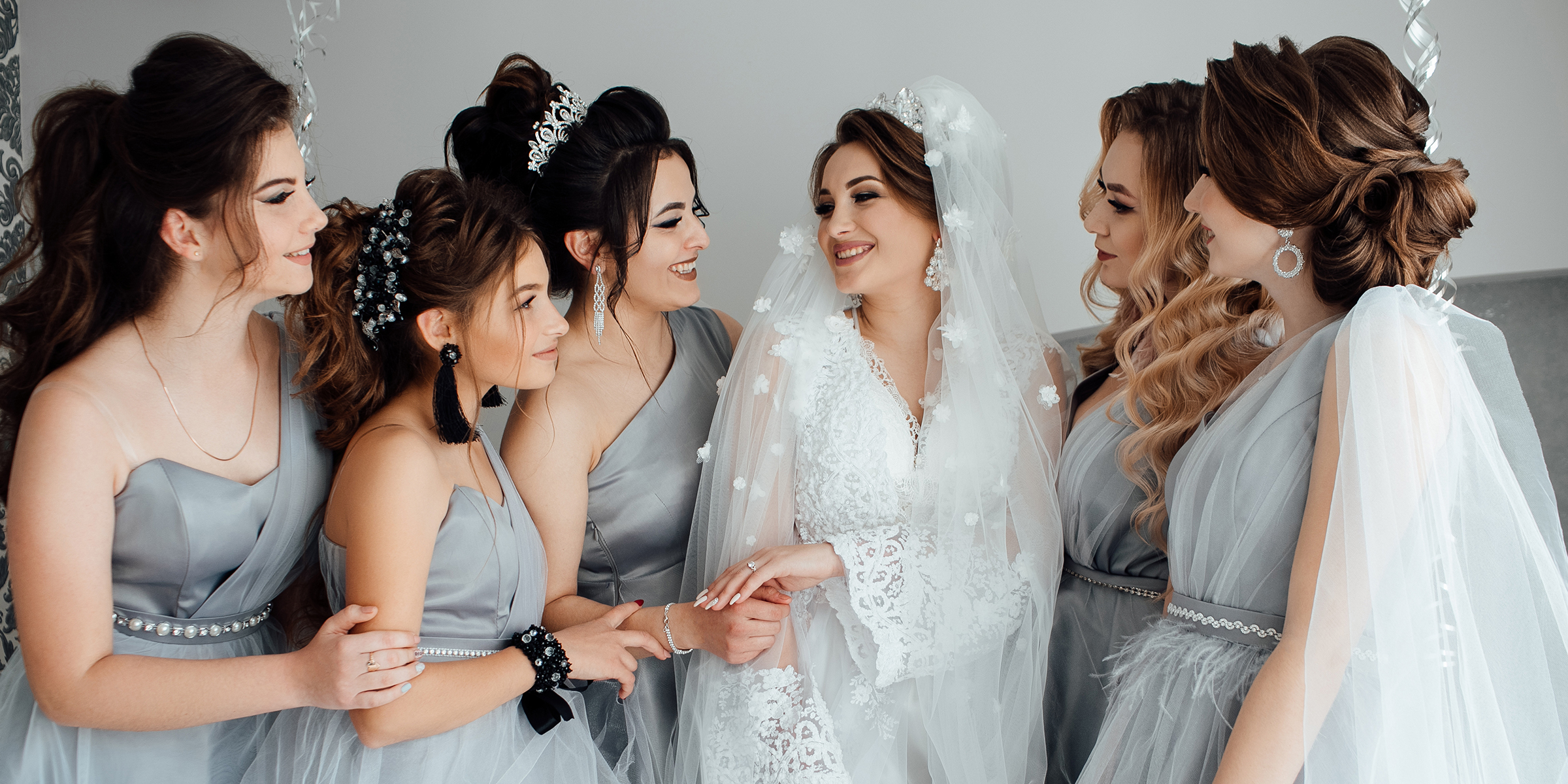 Bride and her bridesmaids | Source: Shutterstock