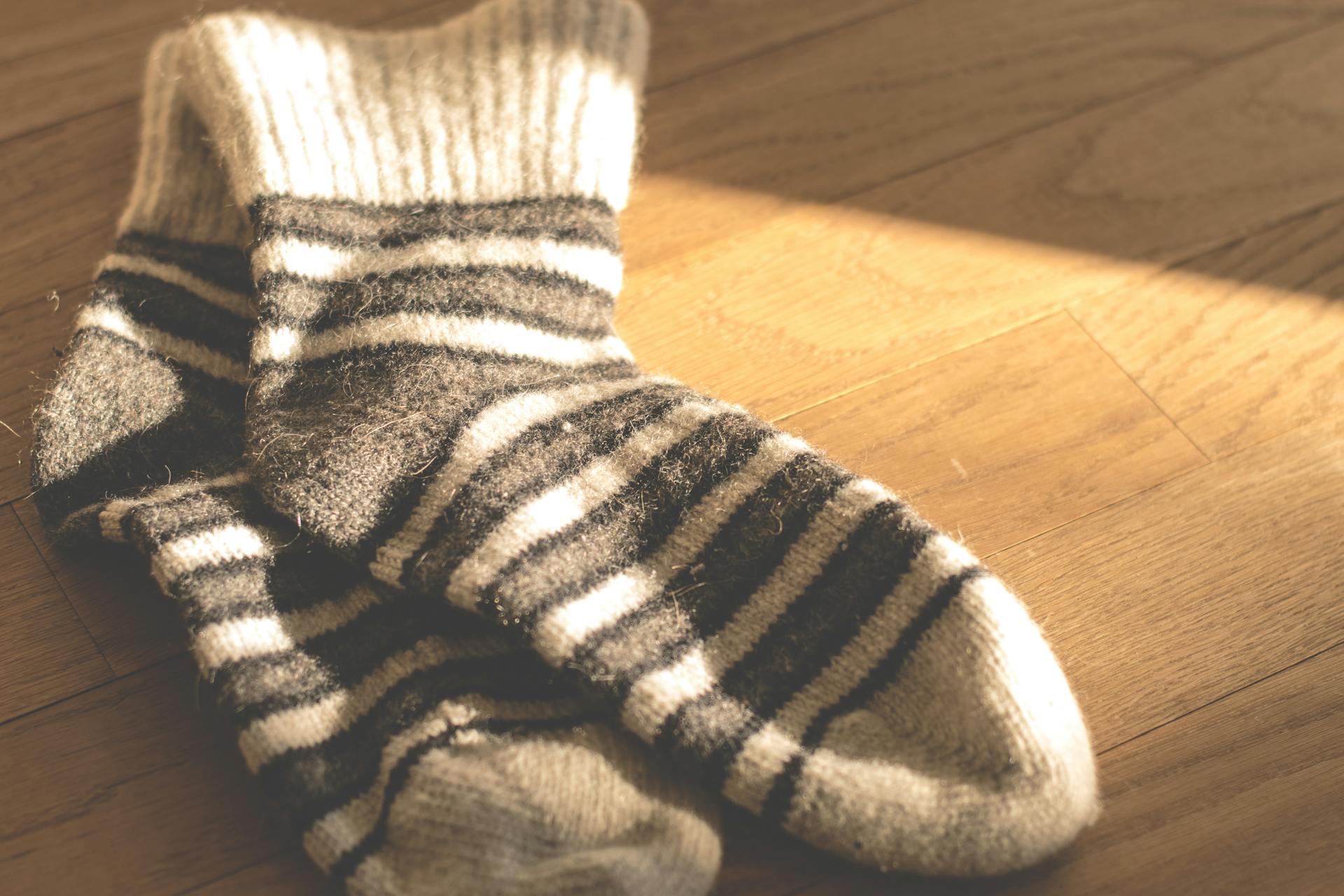 Socks lying on a floor | Source: Pexels