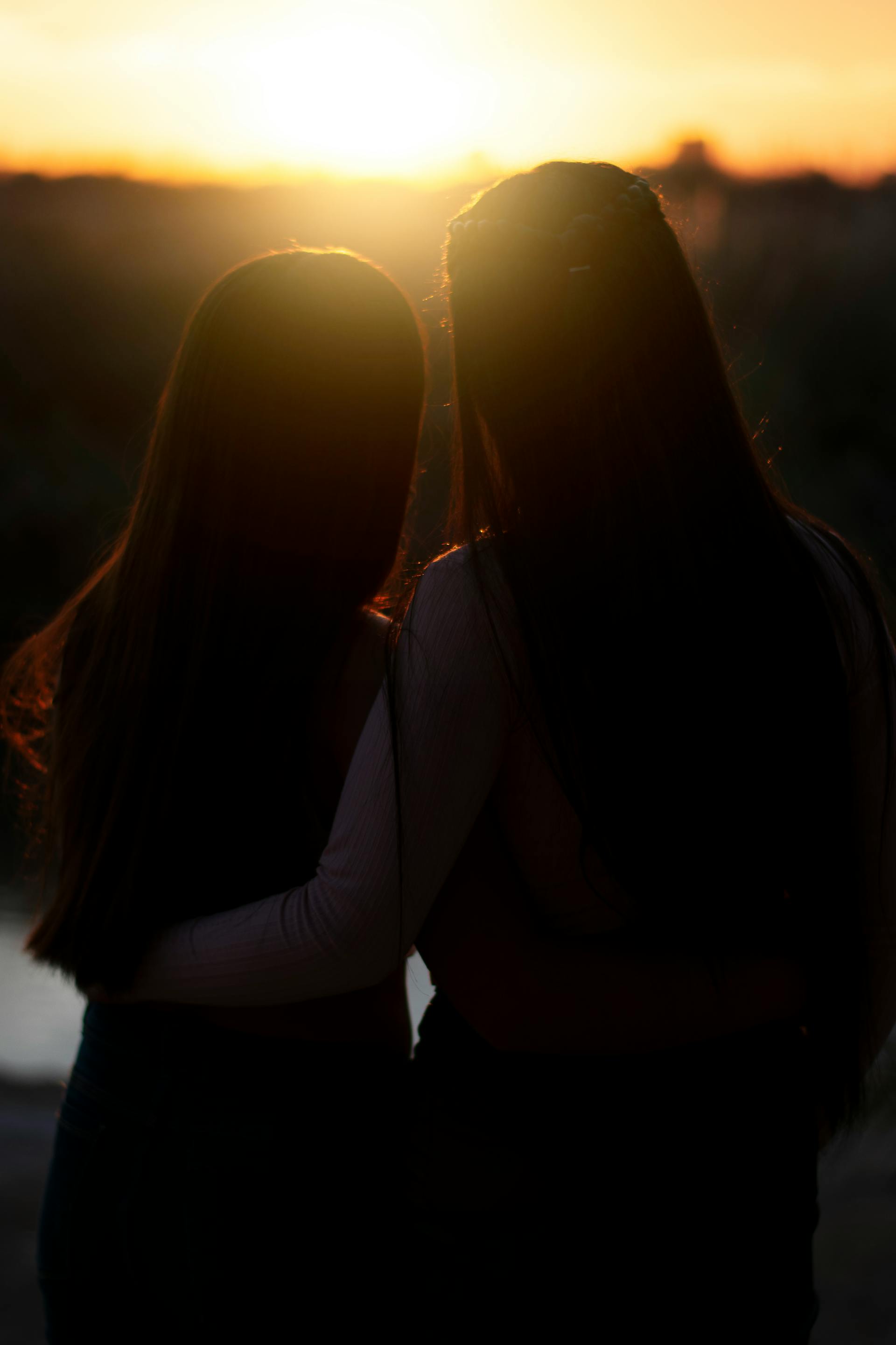 Two women looking at the sunset | Source: Pexels