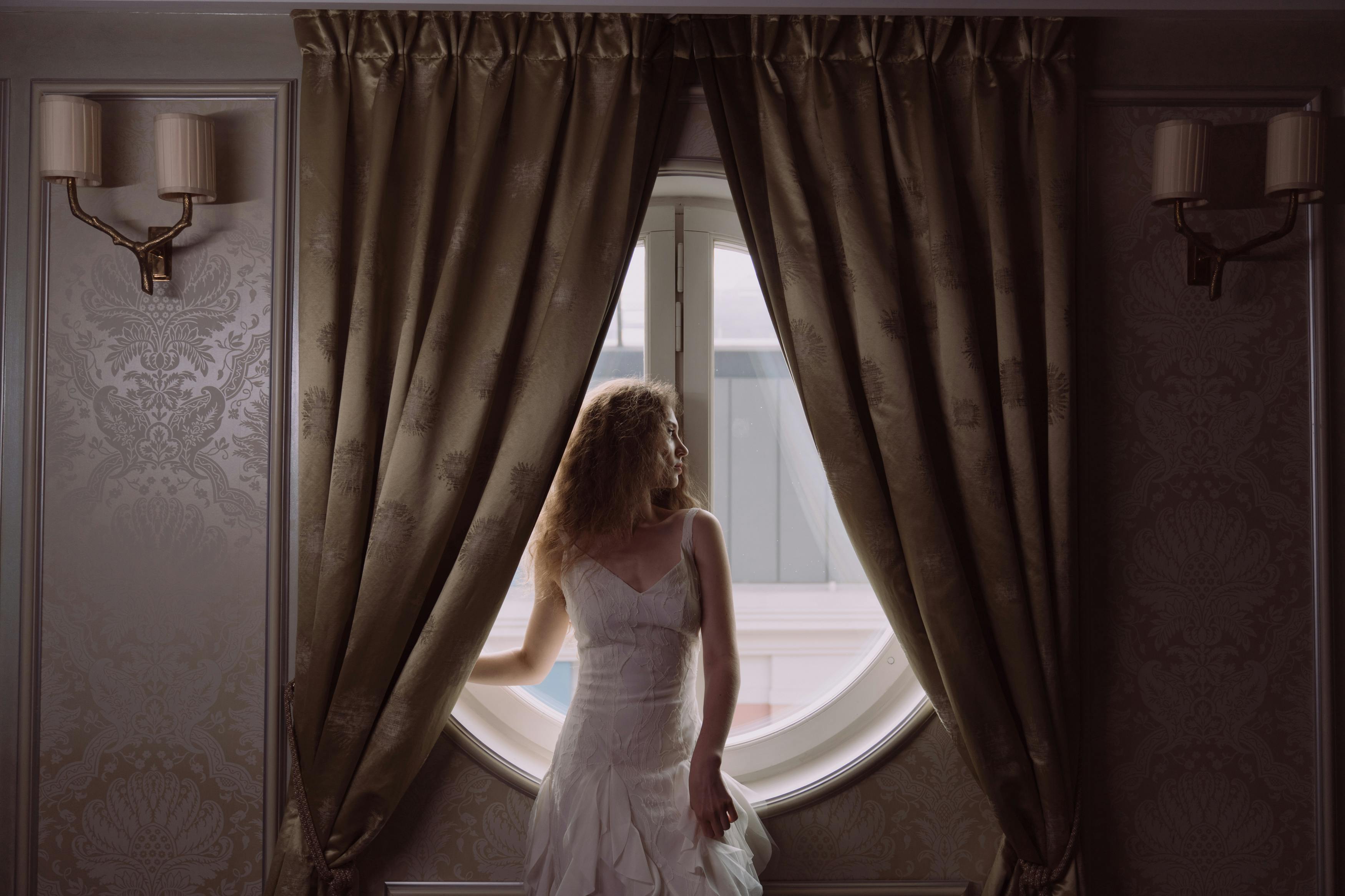 Bride looking outside the window |Source: Pexels