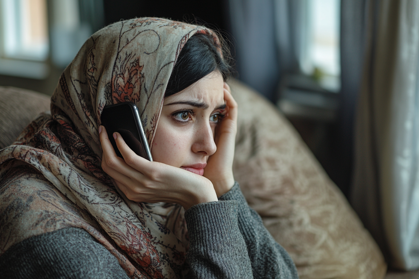 A woman speaking on her phone | Source: Midjourney