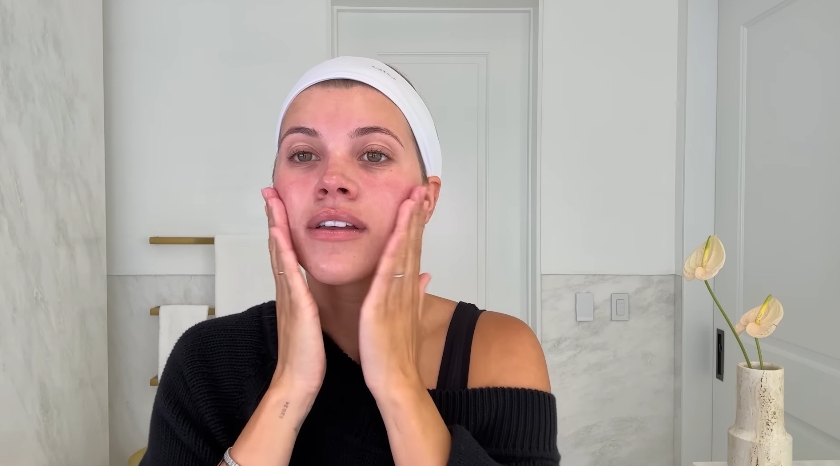 Sofia Richie doing her skincare routine from a video dated July 25, 2025. | Source: YouTube/Vogue
