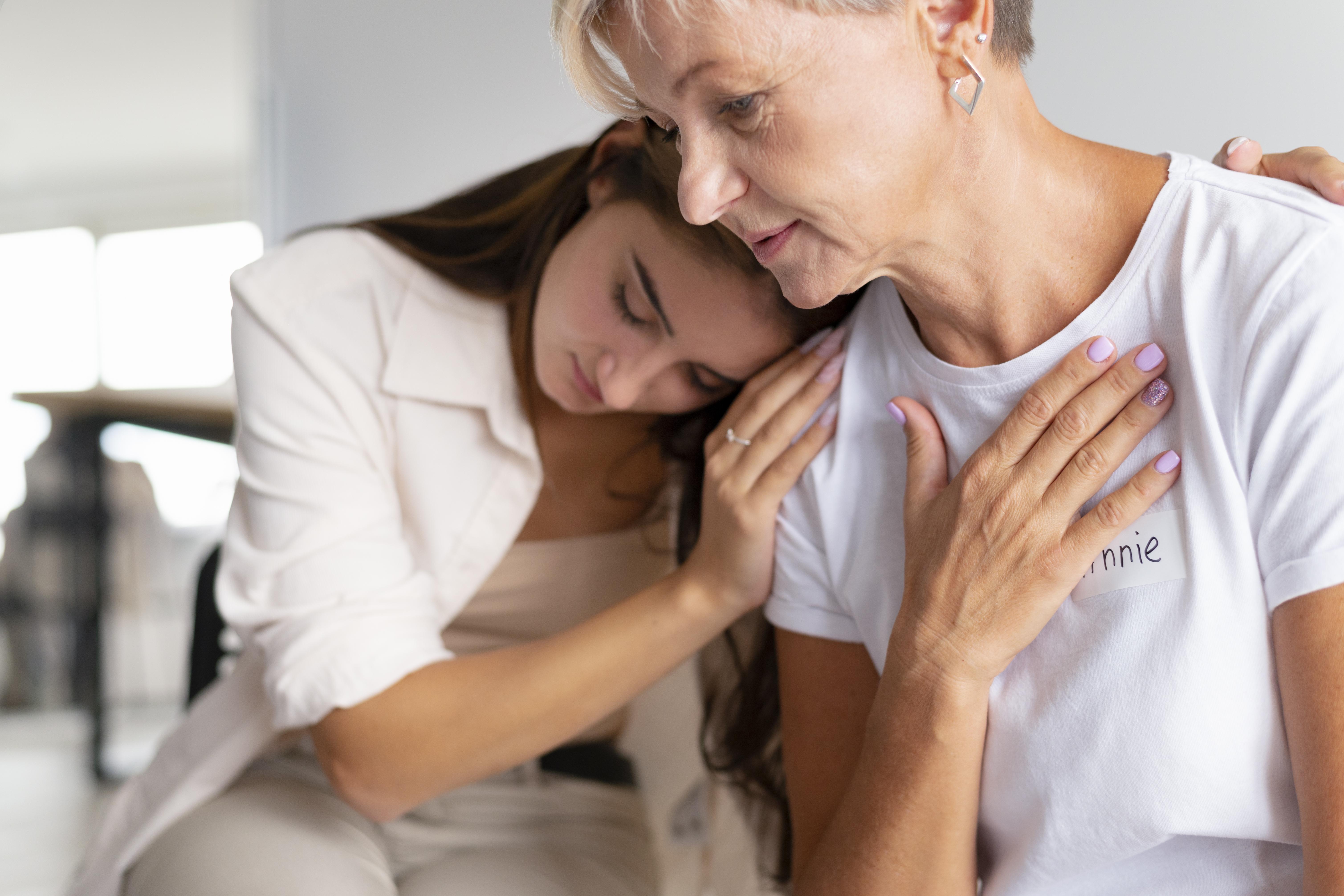 Two women comforting each other | Source: Freepik