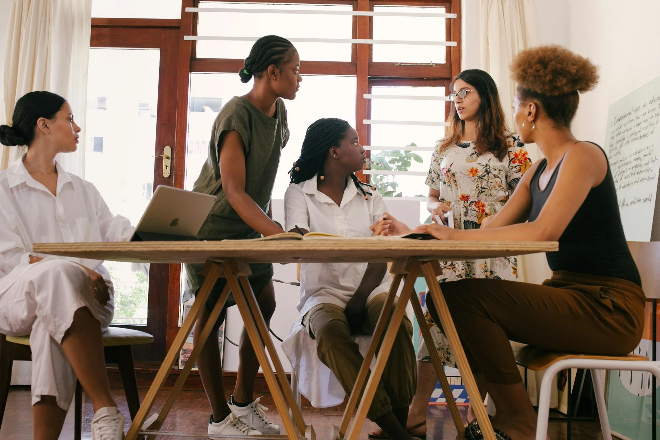 Women working together | Source: Pexels