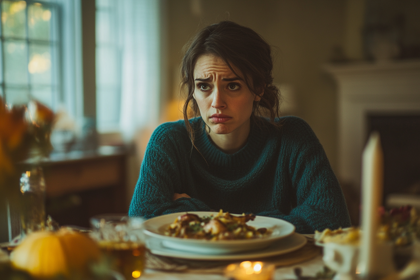 A woman frowning while staring at someone during dinner | Source: Midjourney