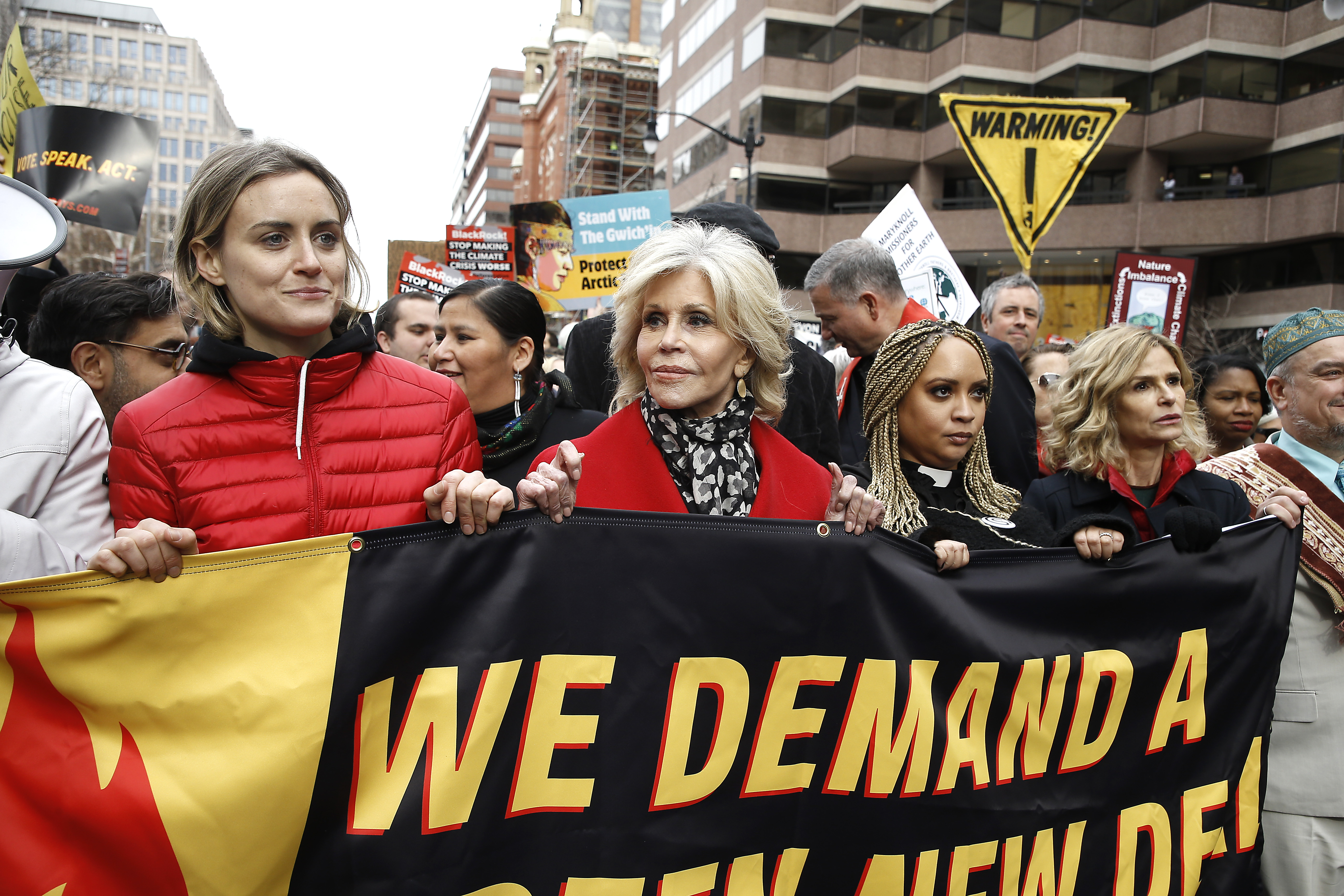 Taylor Schilling, Jane Fonda , Khadouna and Kyra Segwick demonstrate during "Fire Drill Friday" climate change protest on December 6, 2019, in Washington, DC. | Source: Getty Images