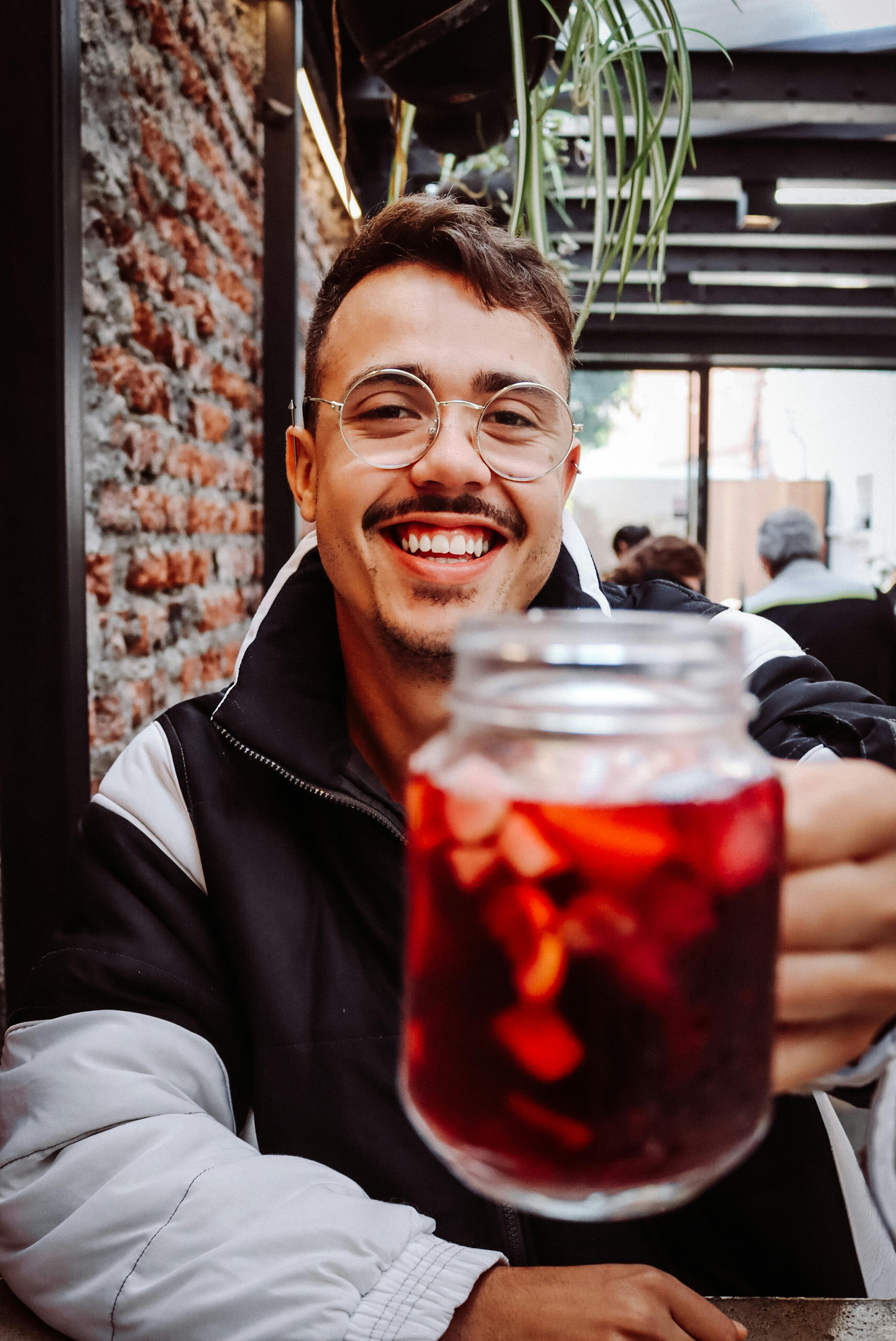 A man holding a jar | Source: Pexels