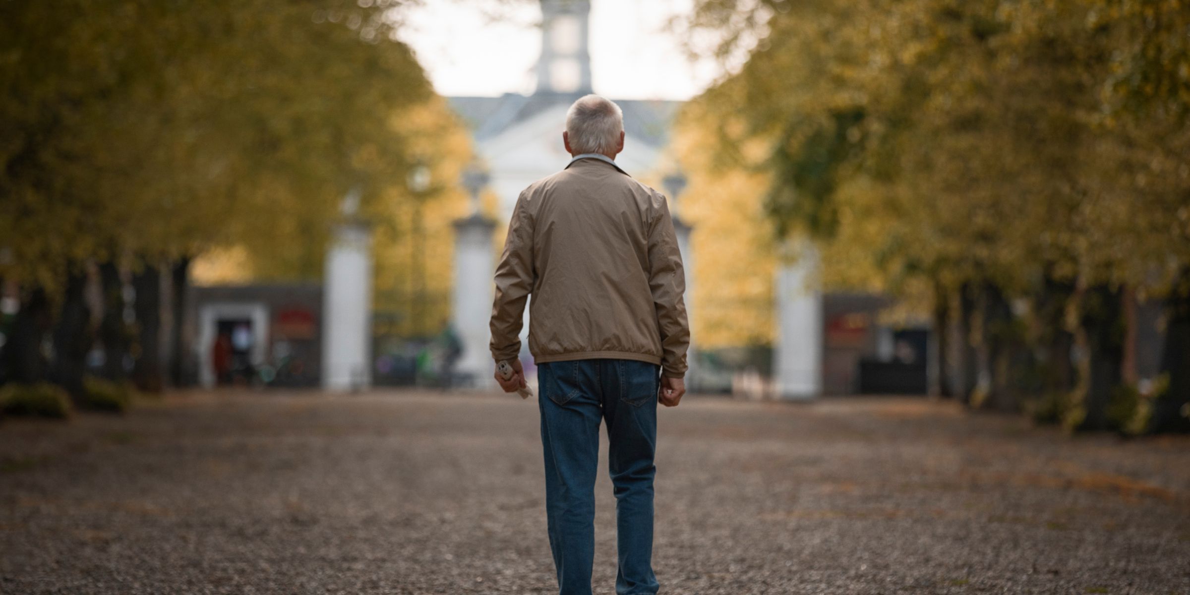 An older man walking away | Source: Freepik