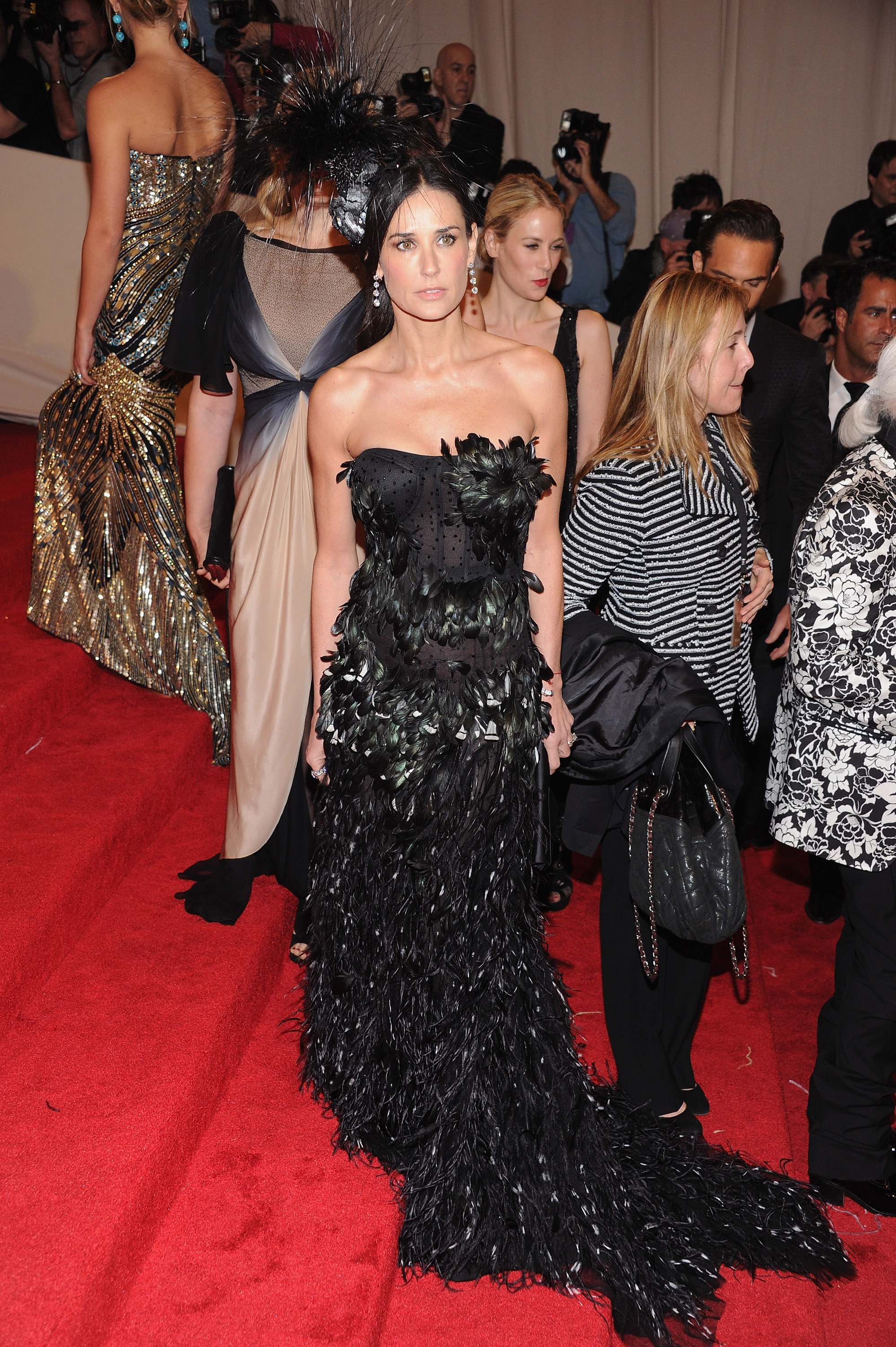 Demi Moore looks radiant in black as she attends the "Alexander McQueen: Savage Beauty" Costume Institute Gala at The Metropolitan Museum of Art on May 2, 2011 in New York City.