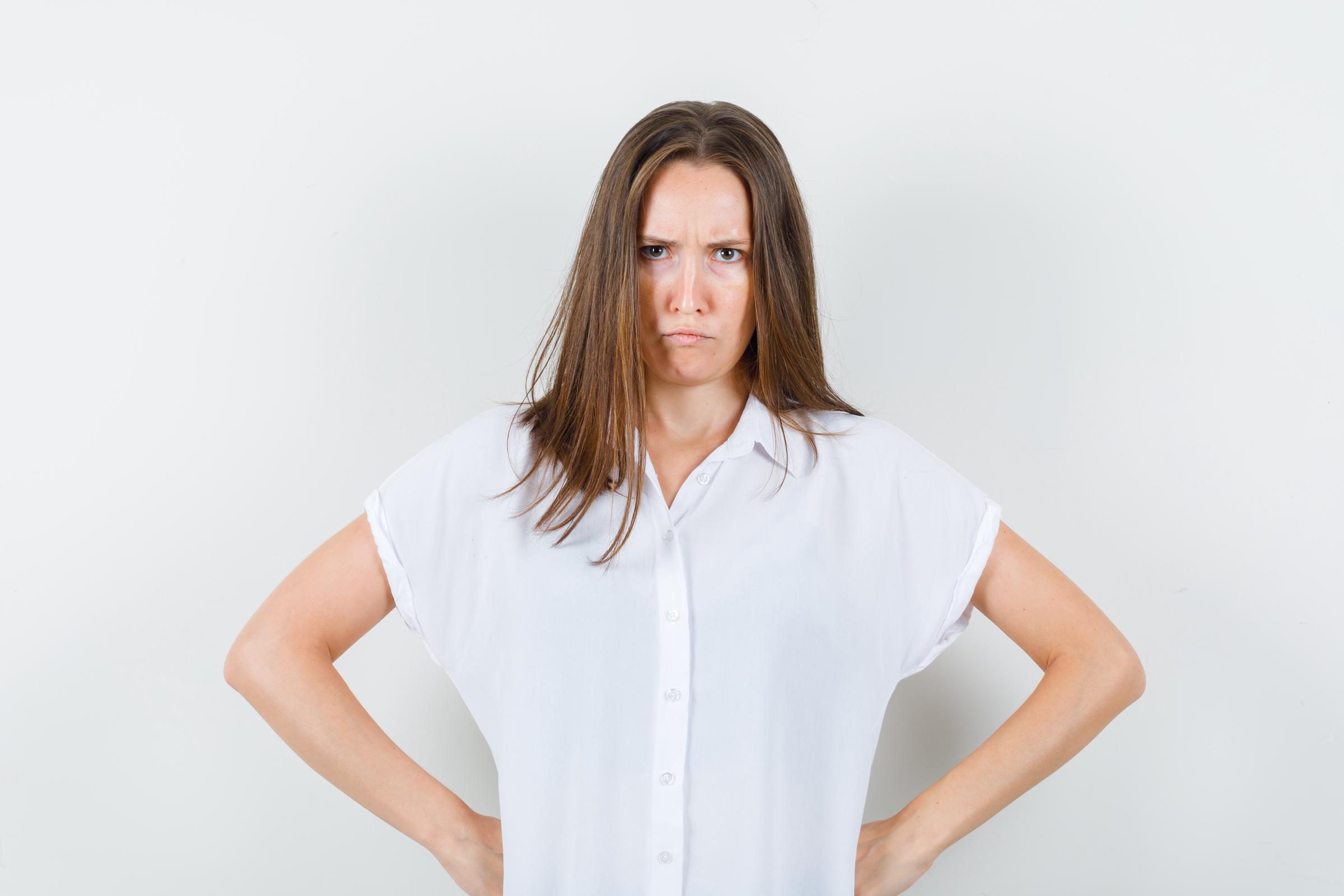 A woman frowning | Source: Freepik