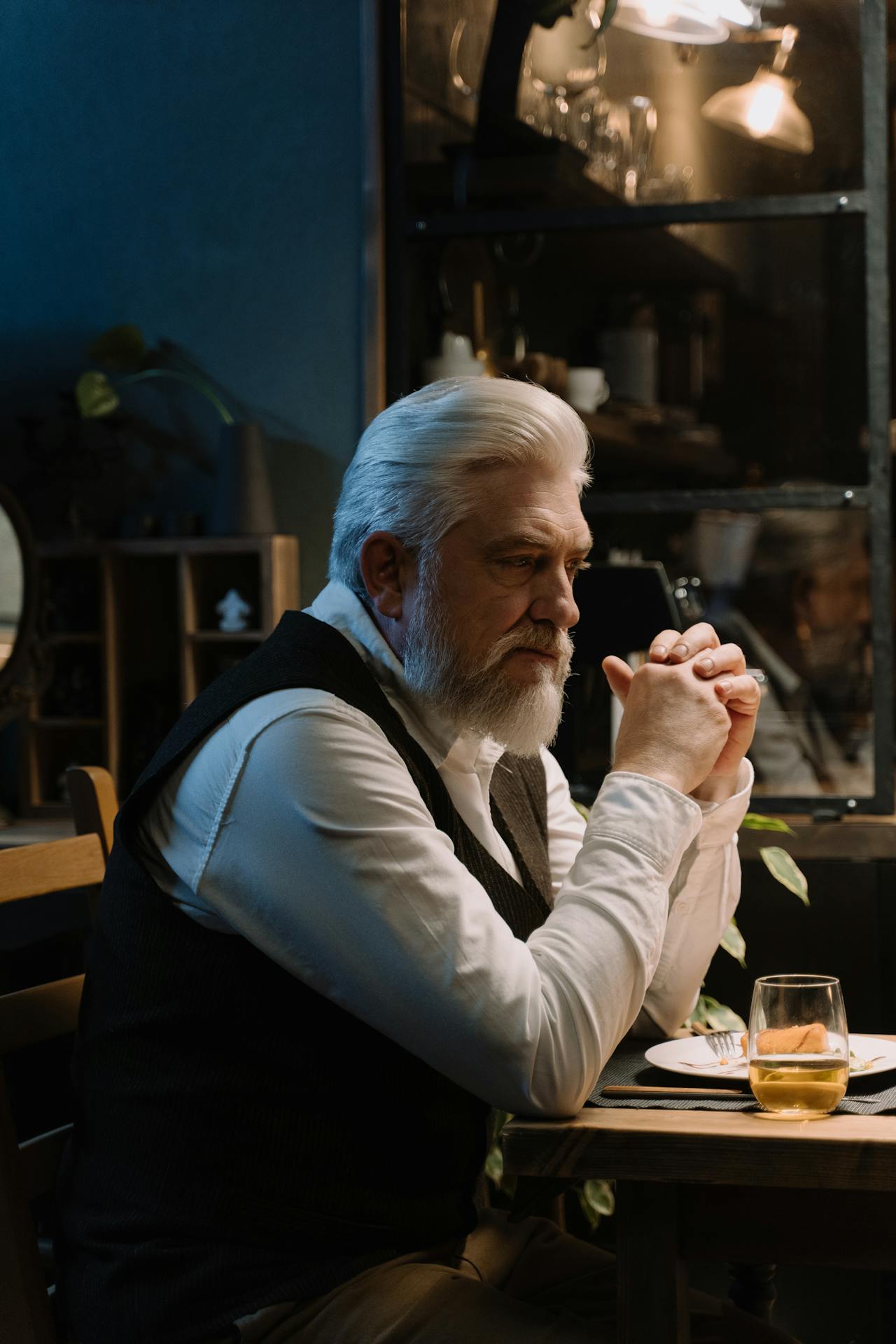 An annoyed senior man in a dining room | Source: Pexels