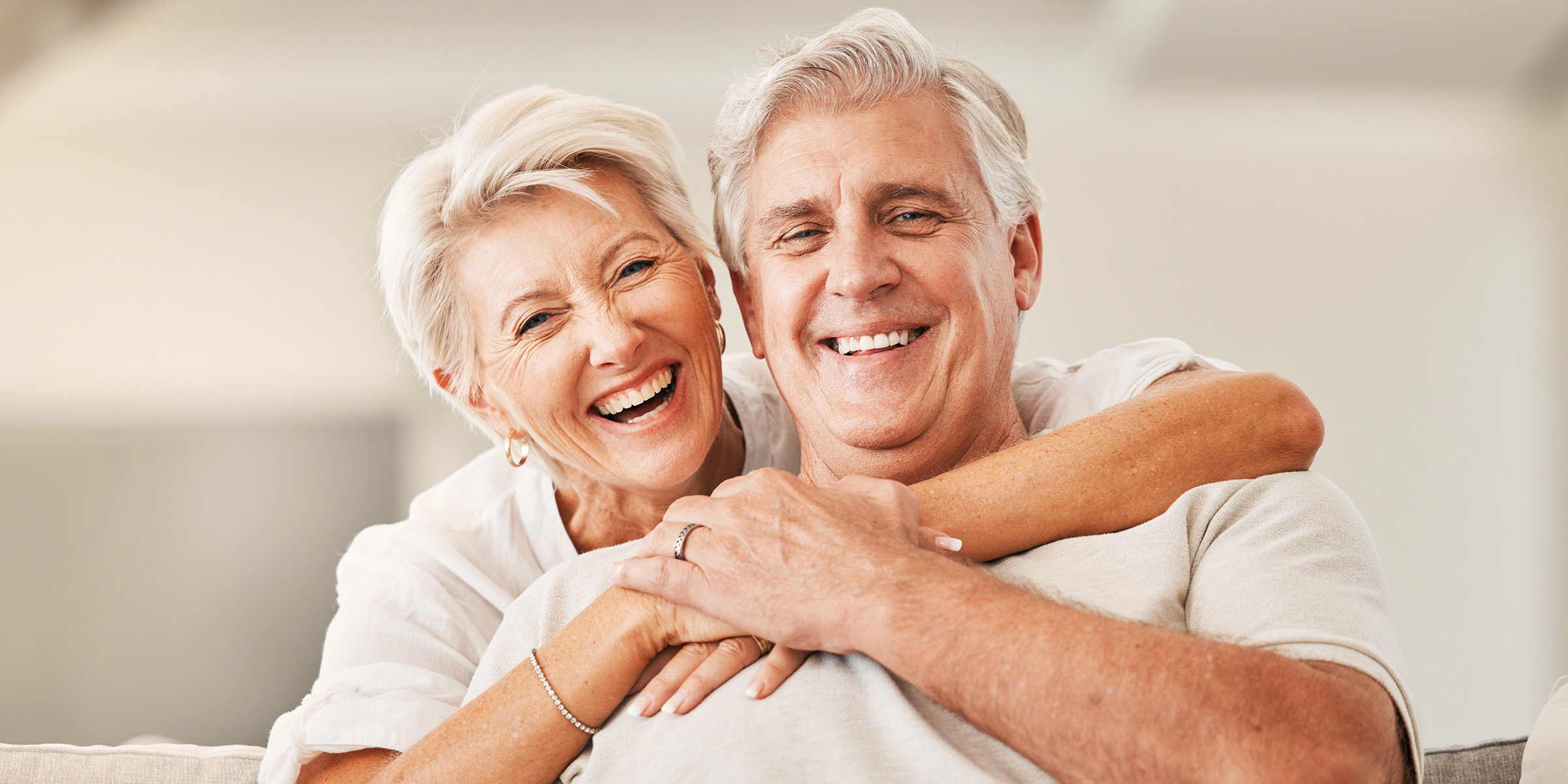 An elderly couple smiling | Source: Shutterstock