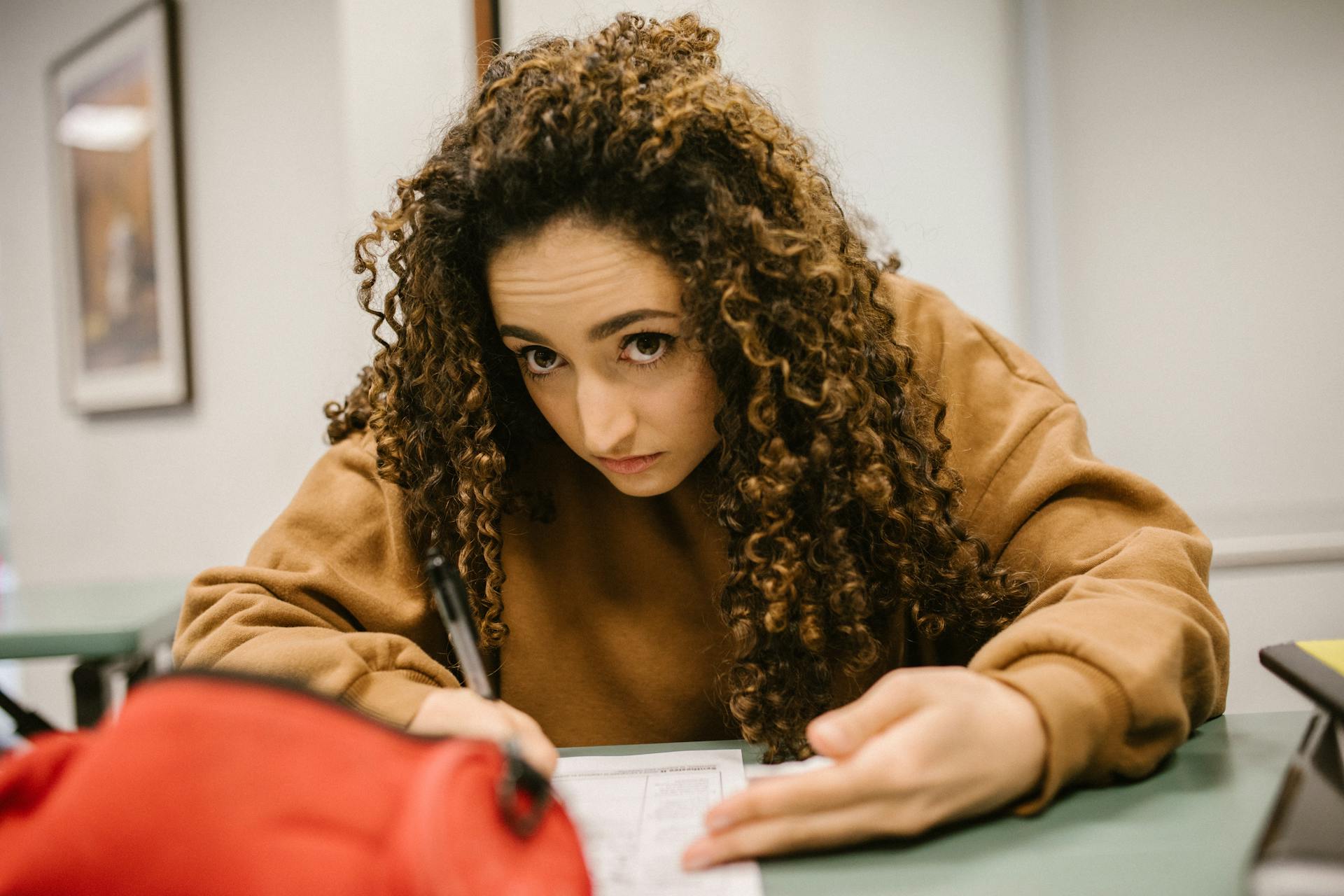 A teen girl in a high school class | Source: Pexels