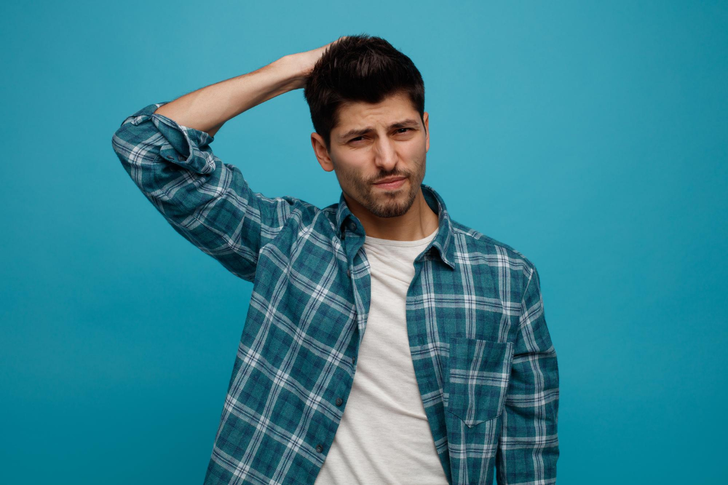 A regretful man looking guilty | Source: Freepik