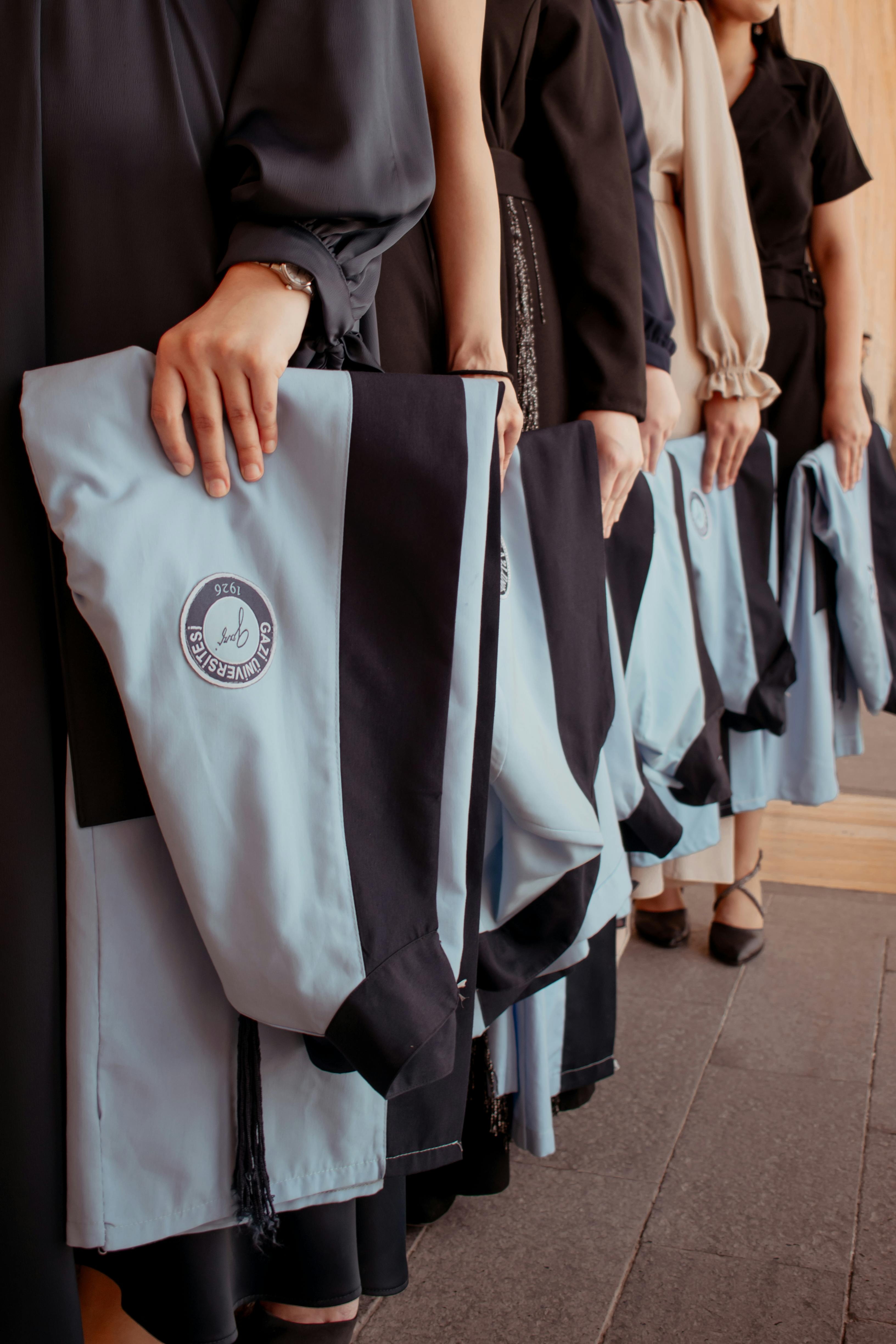 Lined-up graduates | Source: Pexels